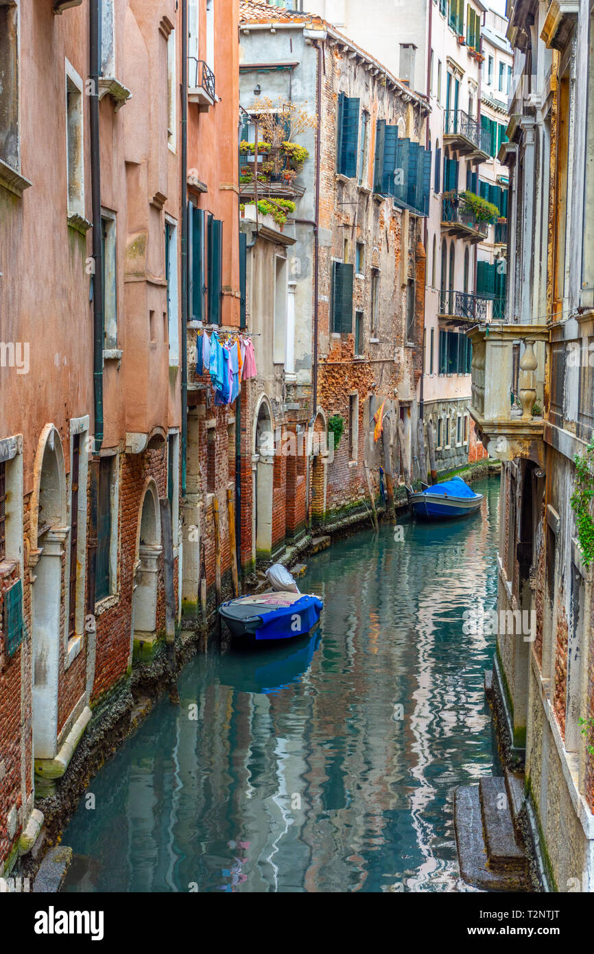 Canal in Venice with traditional old houses, Italy Stock Photo - Alamy