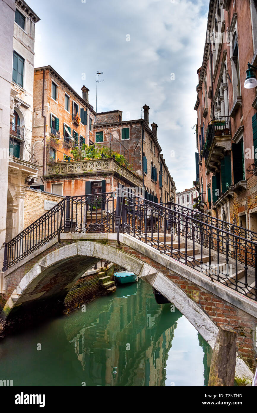 Canal in Venice with traditional old houses, Italy Stock Photo - Alamy