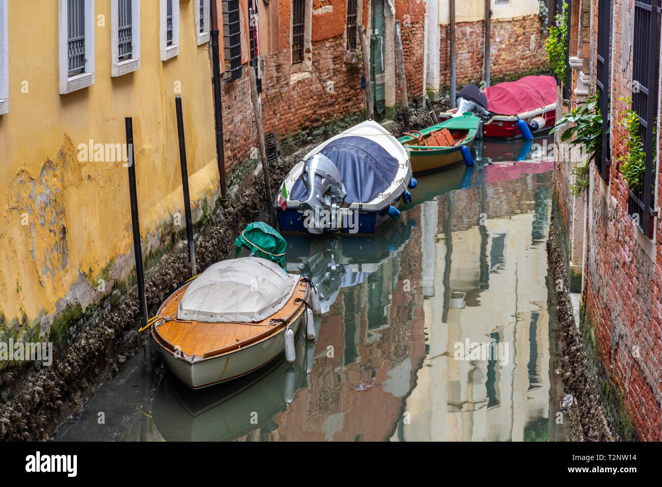 Canal in Venice with traditional old houses, Italy Stock Photo - Alamy