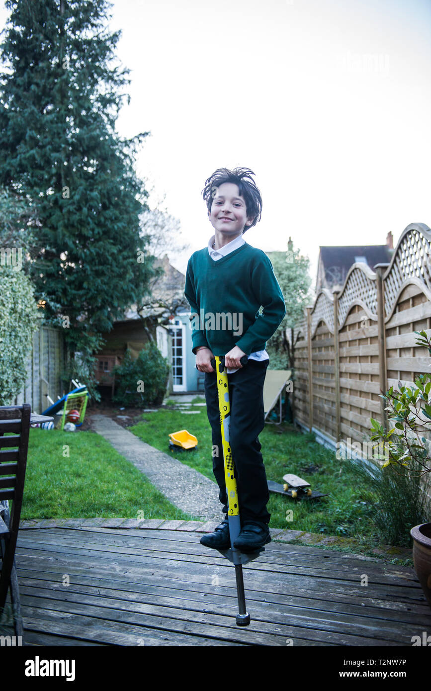 Pogo stick jumping hires stock photography and images Alamy