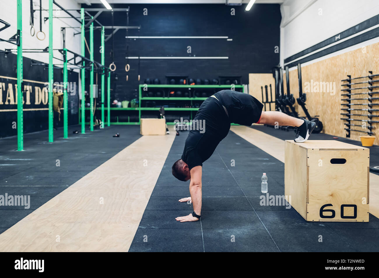Man with disability training in gym Stock Photo