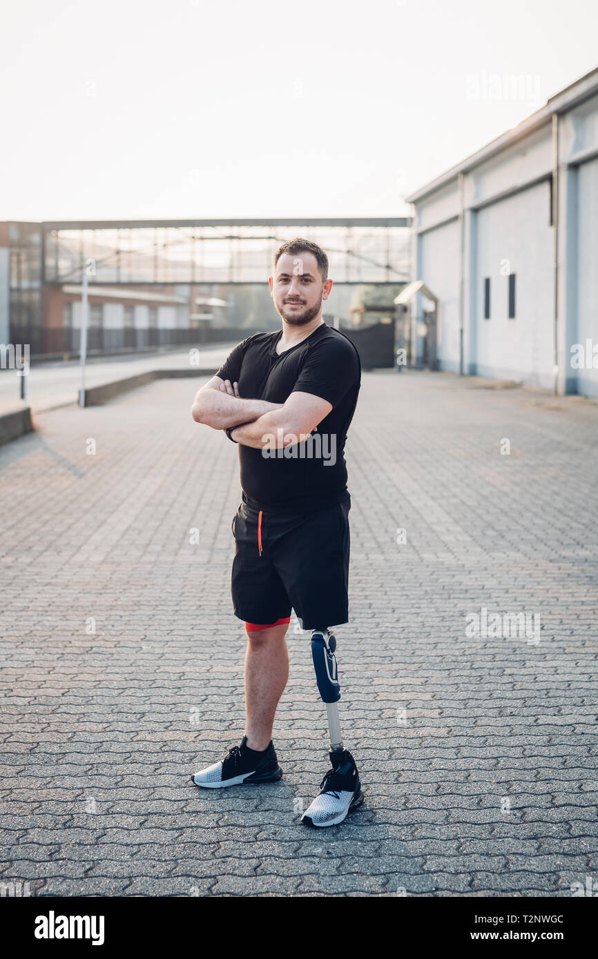 Portrait of man with prosthetic leg Stock Photo