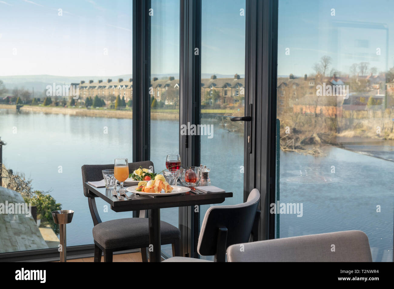 View Of River With Table Setting At Italian Restaurant Stock Photo Alamy