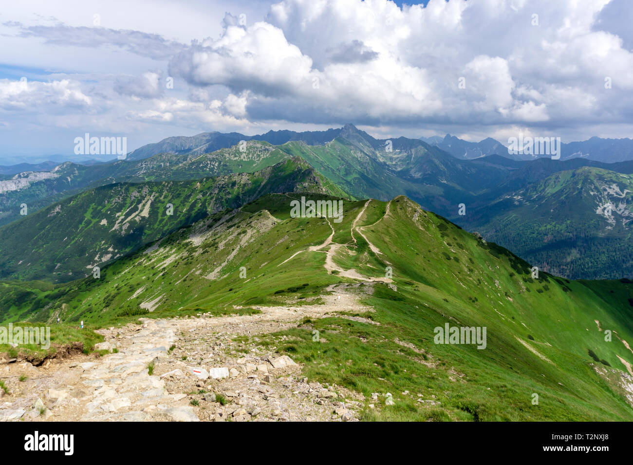 Whirling clouds over the peaks of the Tatra Mountains in June Stock ...