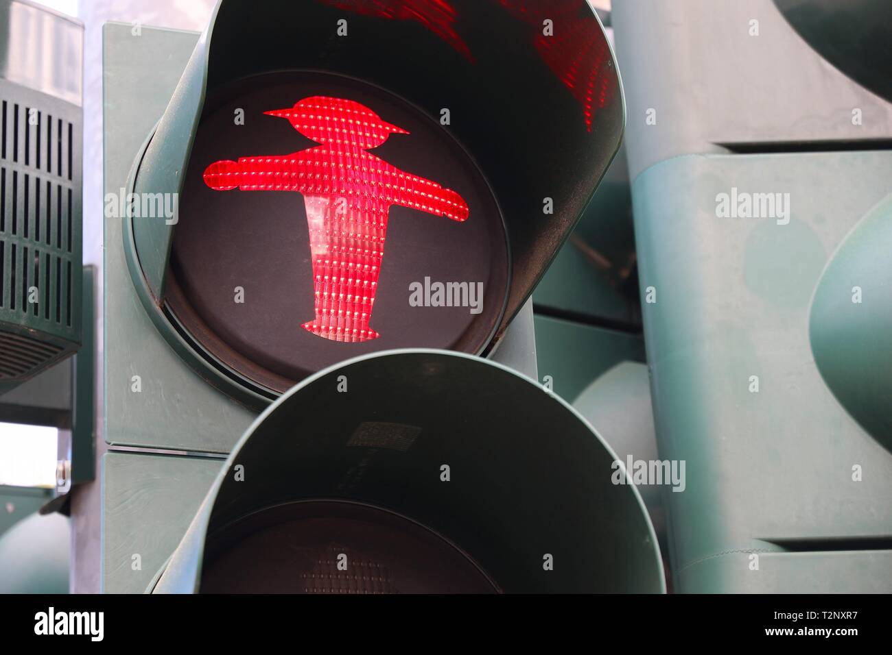 German traffic light - pedestrian red light. Typical pedestrian symbol in Germany. Stock Photo