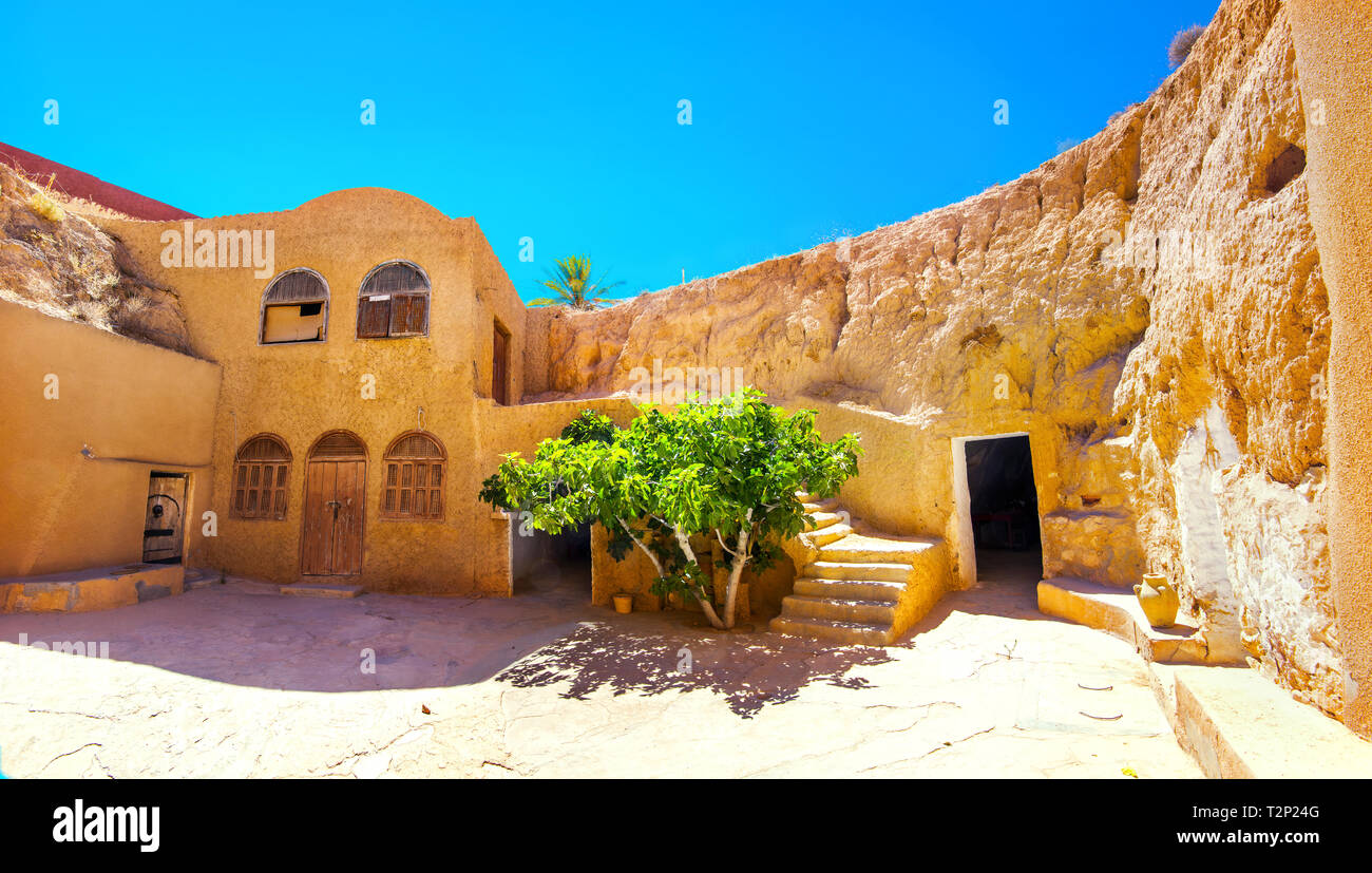 Courtyard of berber underground dwellings. Matmata, Tunisia, North Africa Stock Photo
