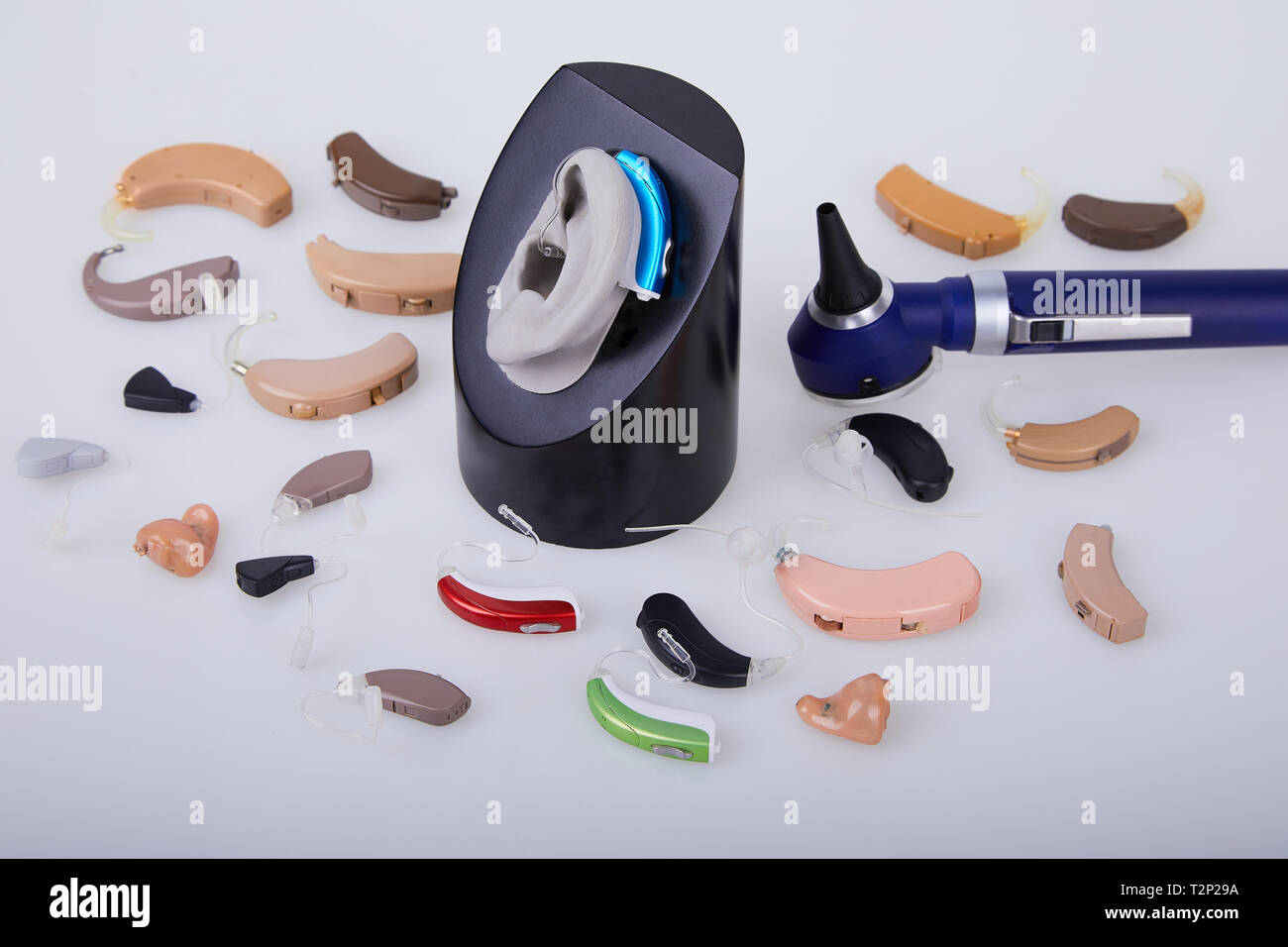 Hearing aids and ENT toolson white background, alternative to surgery