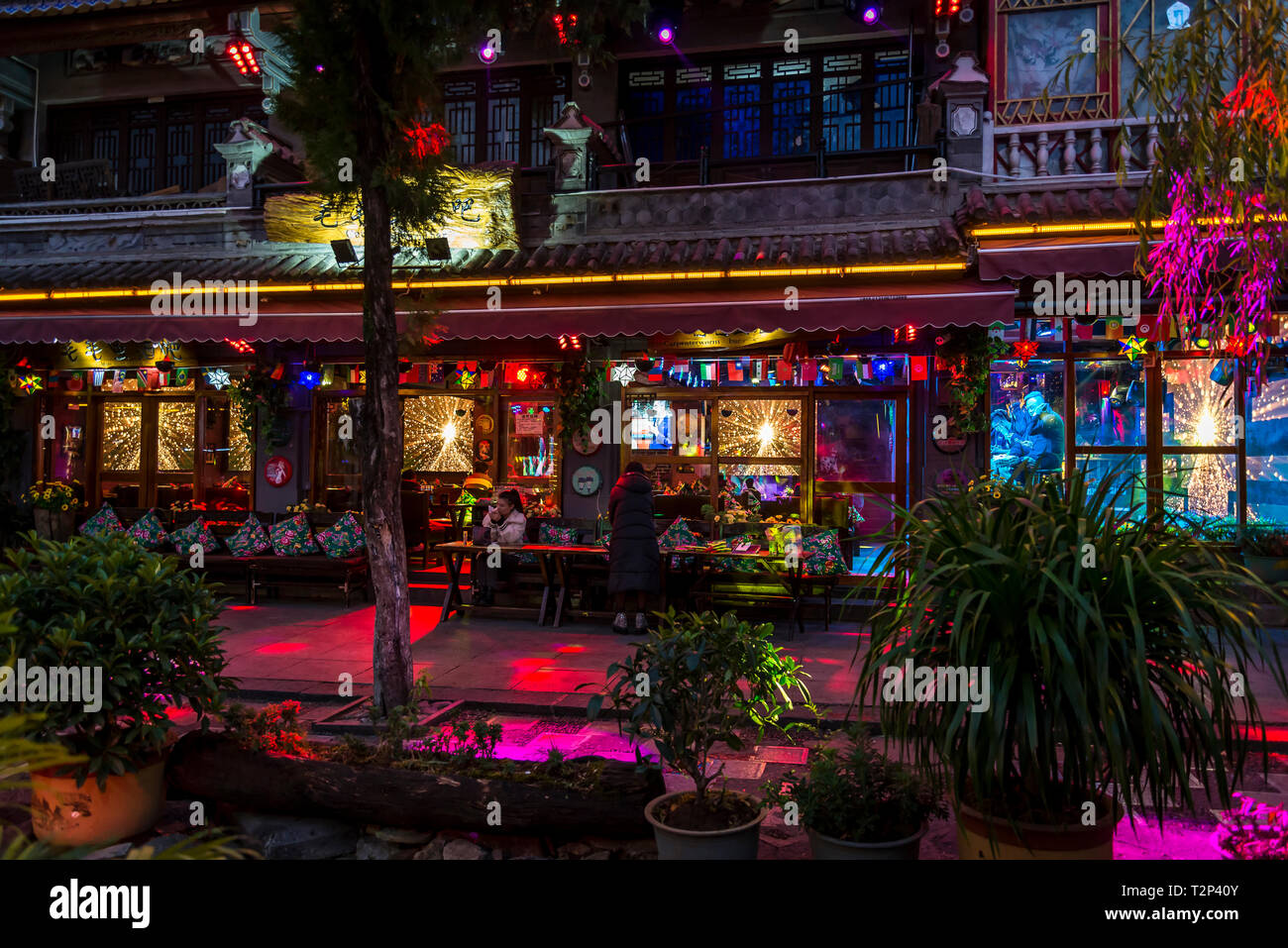 Colourfully decorated bar at night, Dali Old Town, Yunnan province, China  Stock Photo - Alamy