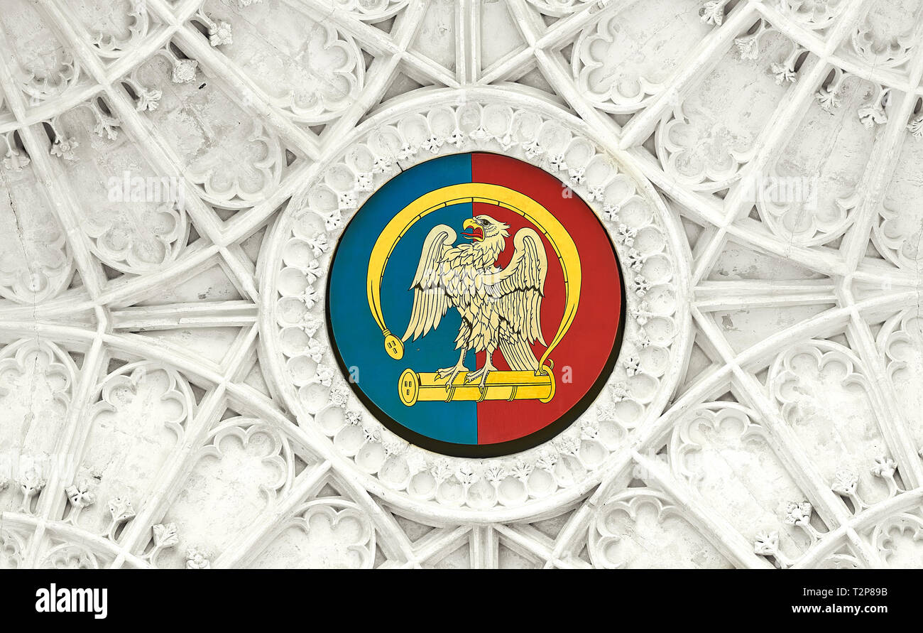 Golden falcon and fetterlock (symbol of the Plantagenets, House of York, kings and royalty of England), this one a fifteenth century ceiling painting. Stock Photo