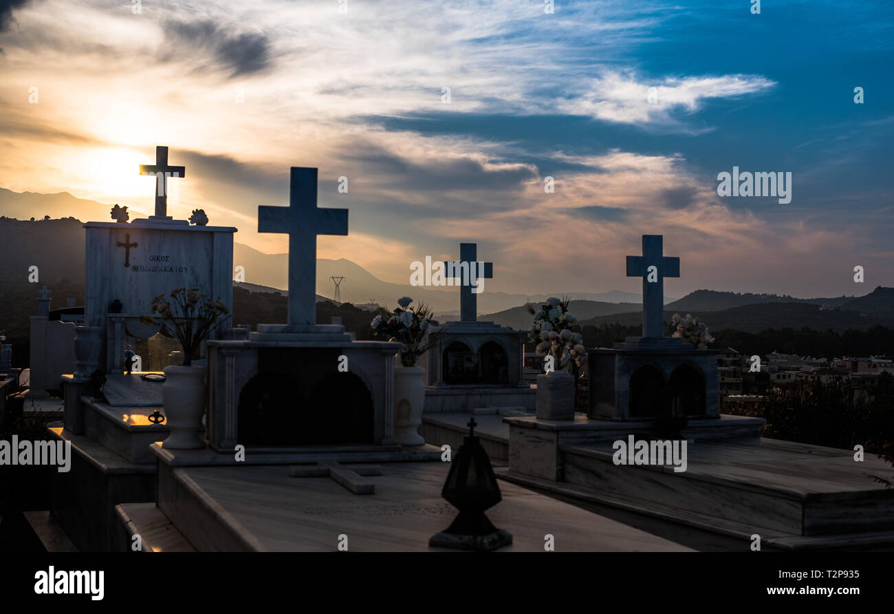 Graveyard in the sunset Stock Photo