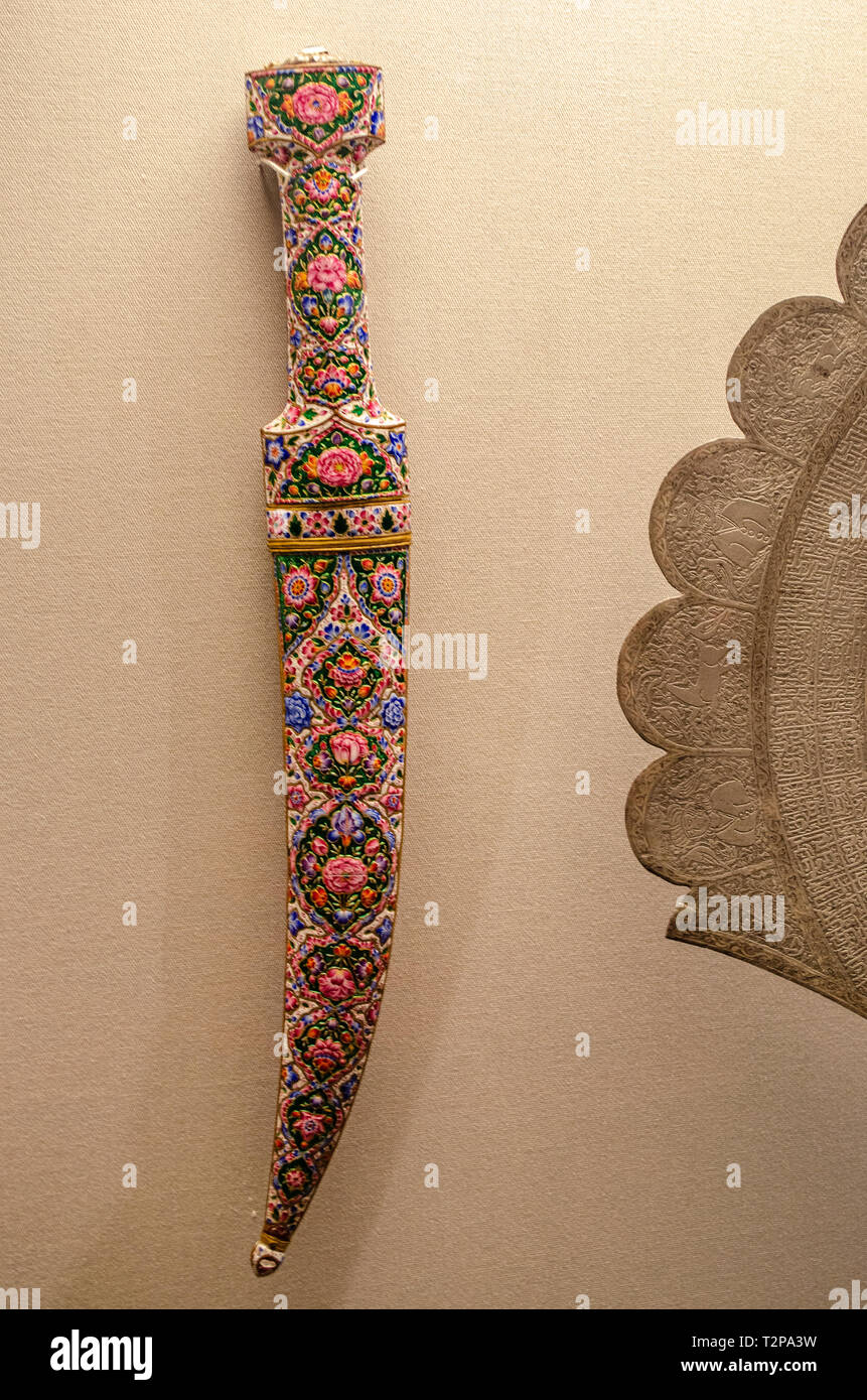 Large dagger (Khanjar).  Jauhar or Damascus steel blade. Hilt and scabbard with enamel in gilt cloisons. Qajar Iran 1800-50 Stock Photo