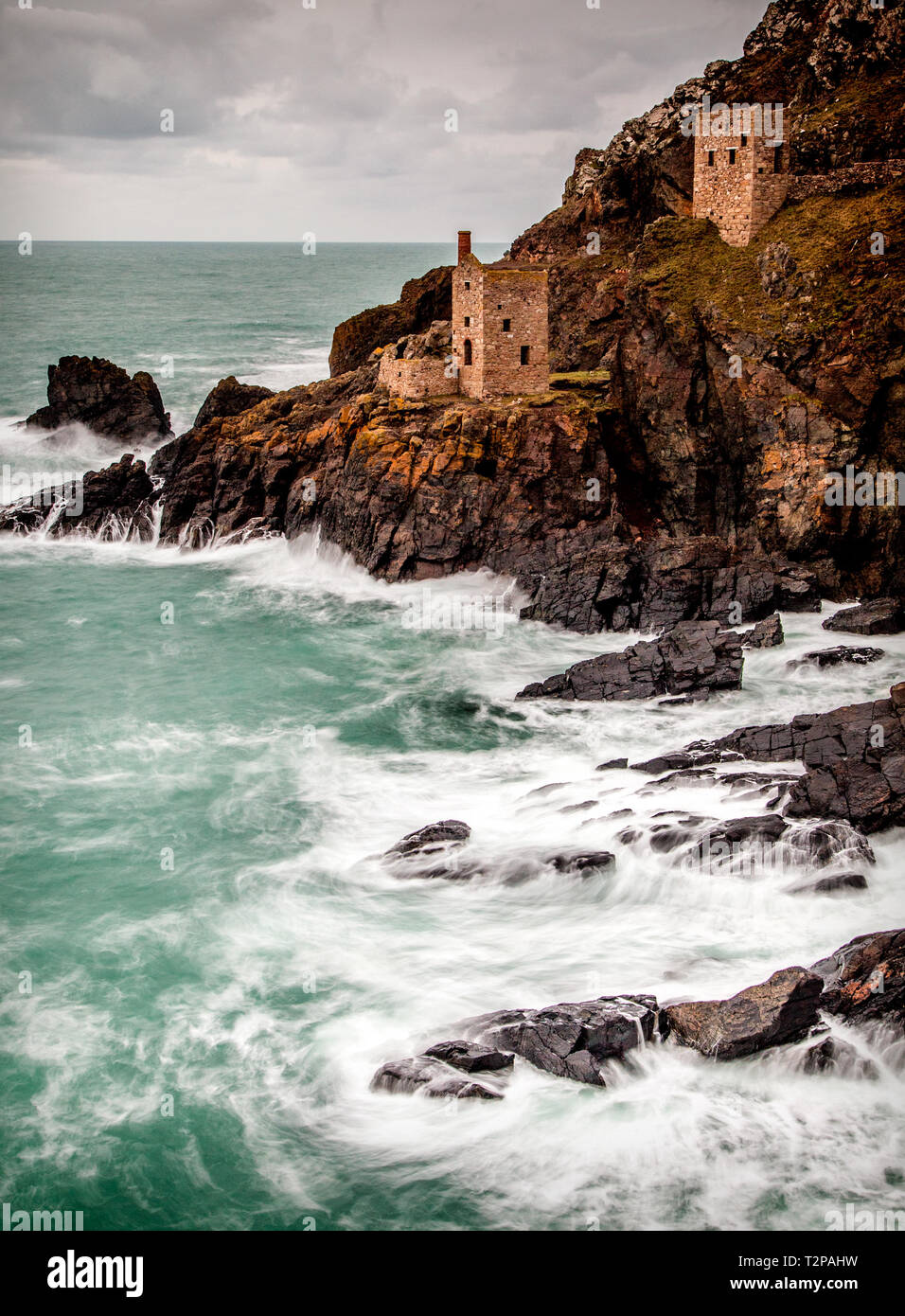 The Crown mine at Botallack on the Southern tip of Cornwall lye in this epic composition hugging the rugged coastline, Stock Photo