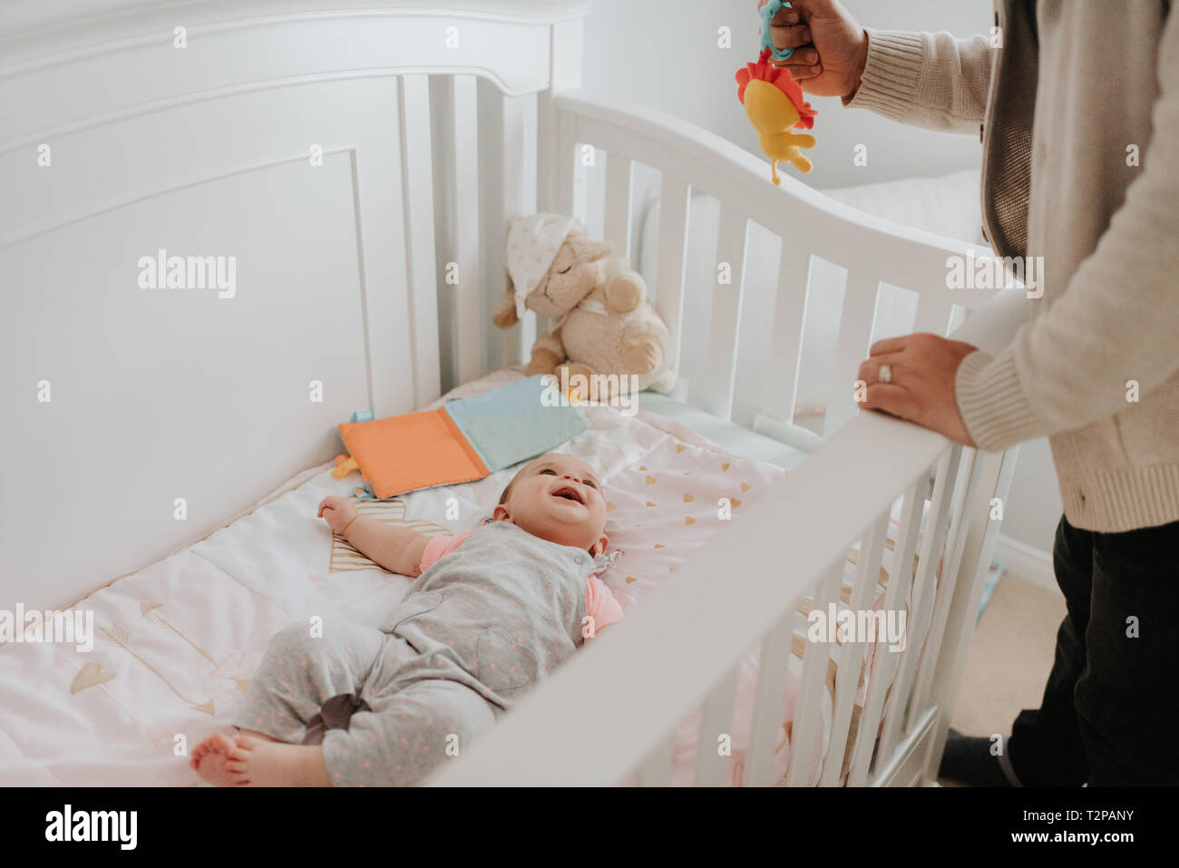 Baby in crib father hires stock photography and images Alamy