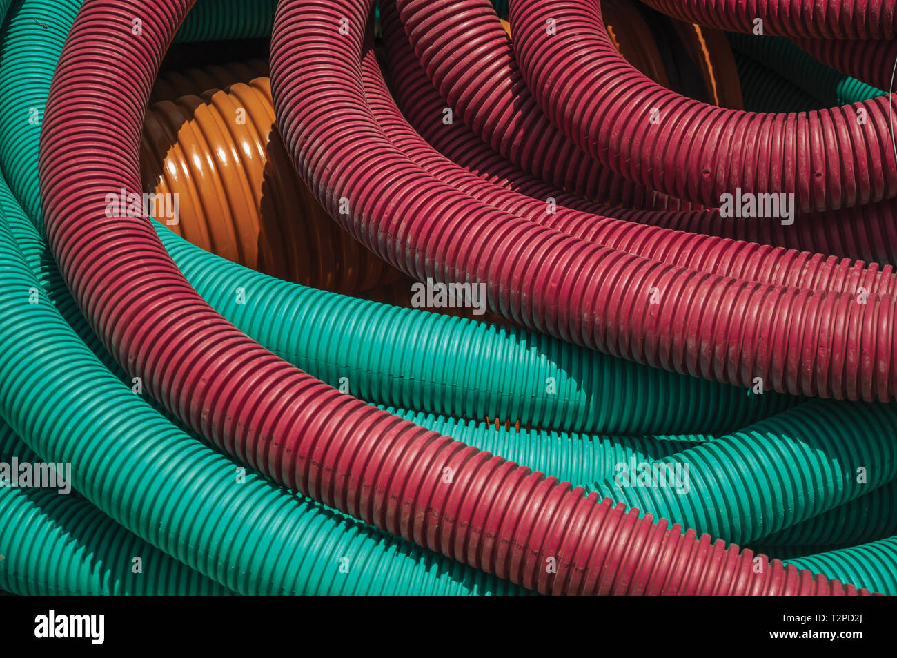 Colorful plastic pipes for electrical wiring or cables on a