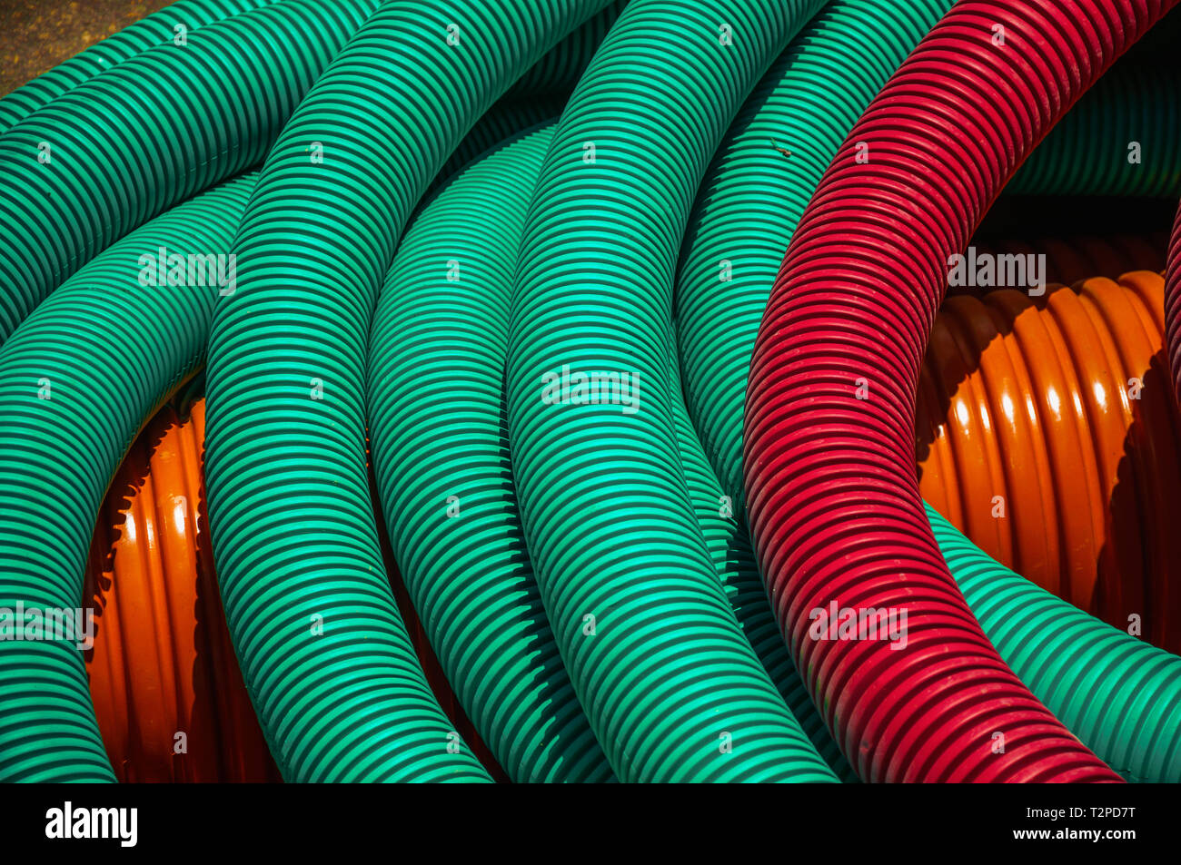 Colorful plastic pipes for electrical wiring or cables on a