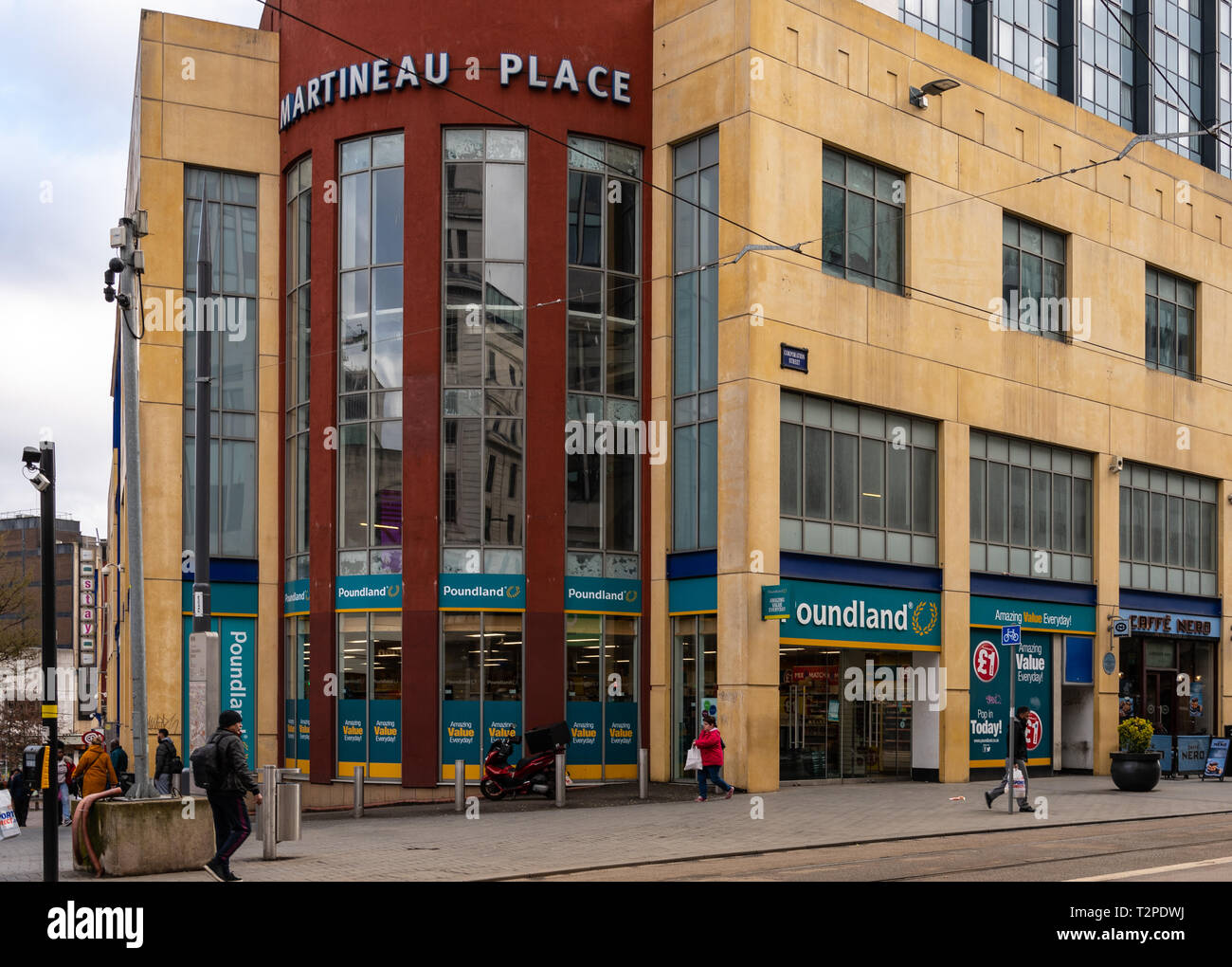 Birmingham, England - March 17 2019:   The front of the Poundland store and Caffe Nero in Corporation Street Stock Photo