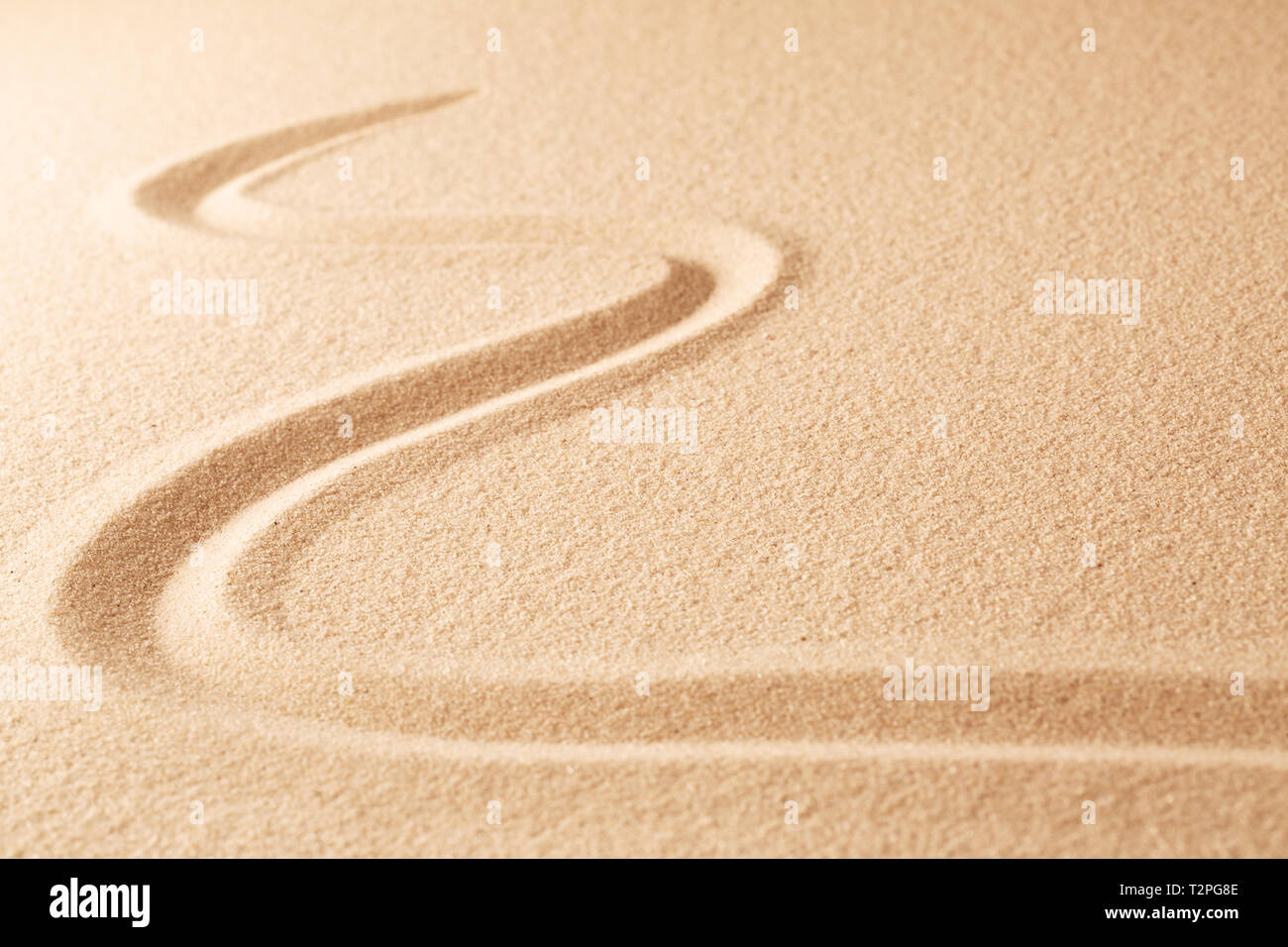 Sand texture background with line pattern. Minimal zen meditation garden. Concept for yoga, spa wellness or buddhism and mindfulness.  With copy space Stock Photo