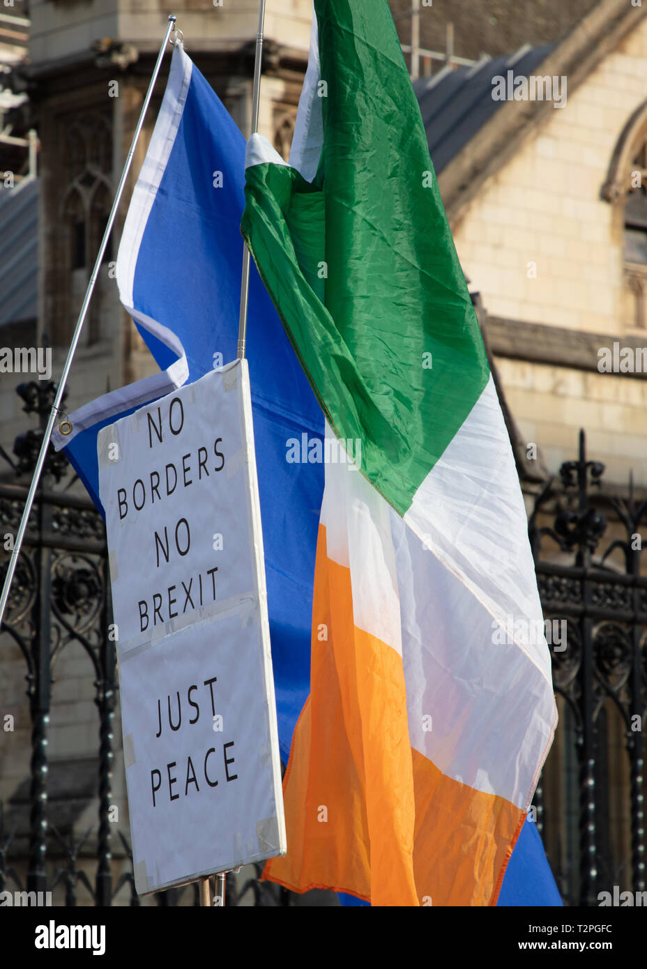 No borders No Brexit Just Peace is written on a placard carried by an Irish anti Brexit protester on Parliament Square, London, UK. Stock Photo