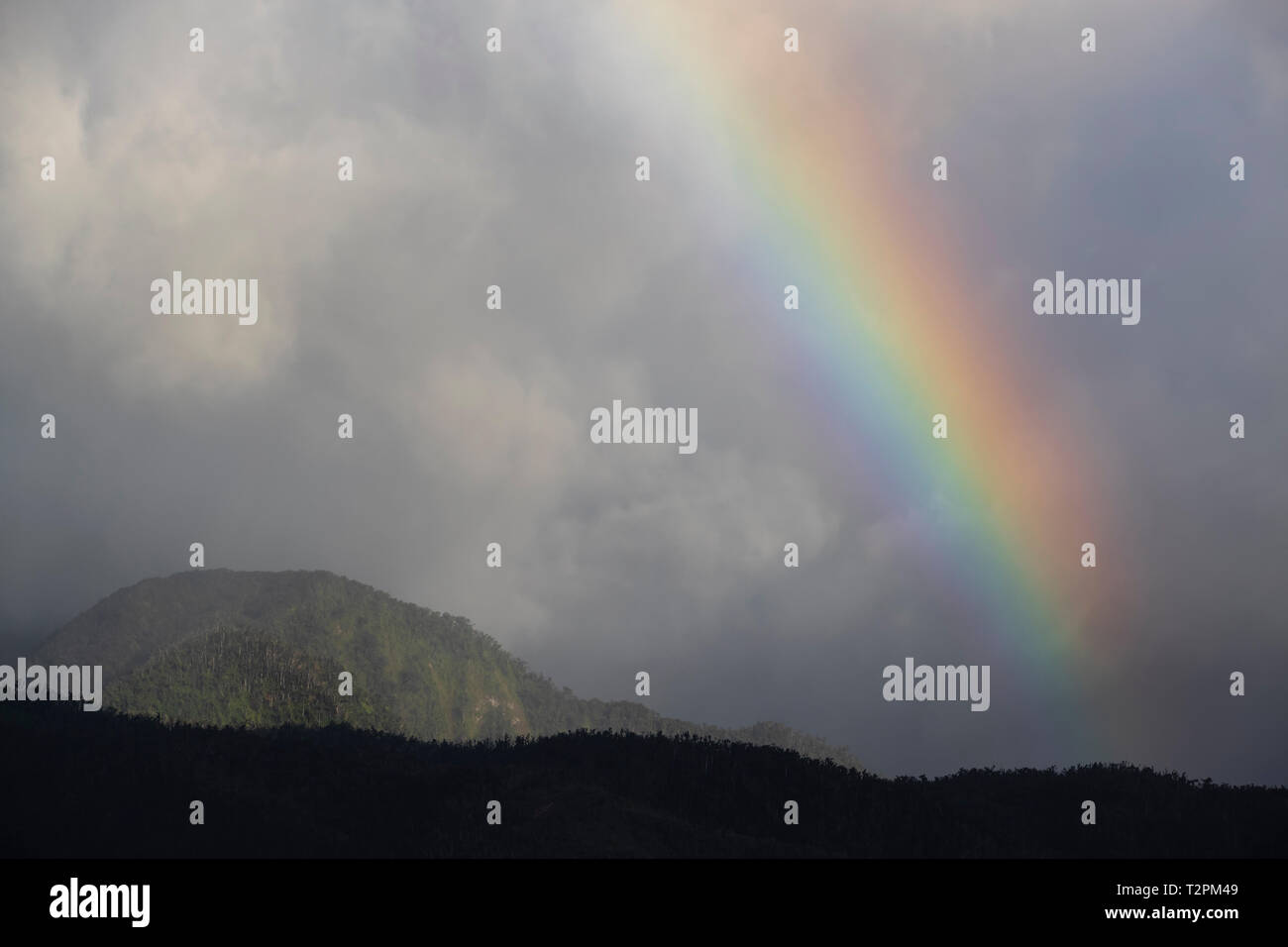 Rainbow over mountainous landscape, Dominica, Caribbean Stock Photo