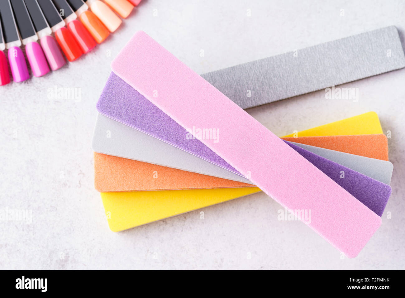 Colorful nail files, swatch palettes. Set of cosmetic tools and