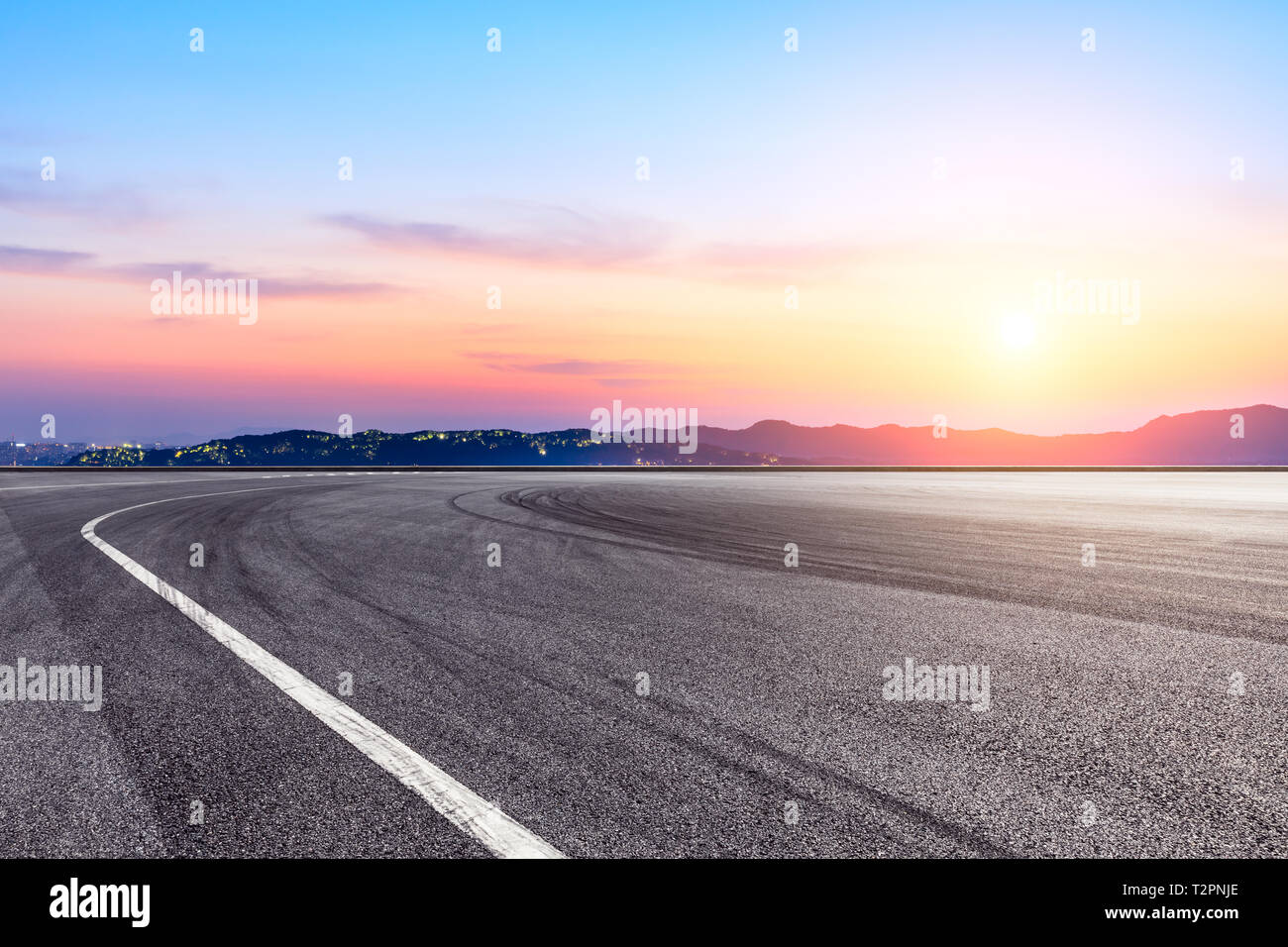 Asphalt race track ground and beautiful mountain nature landscape at ...