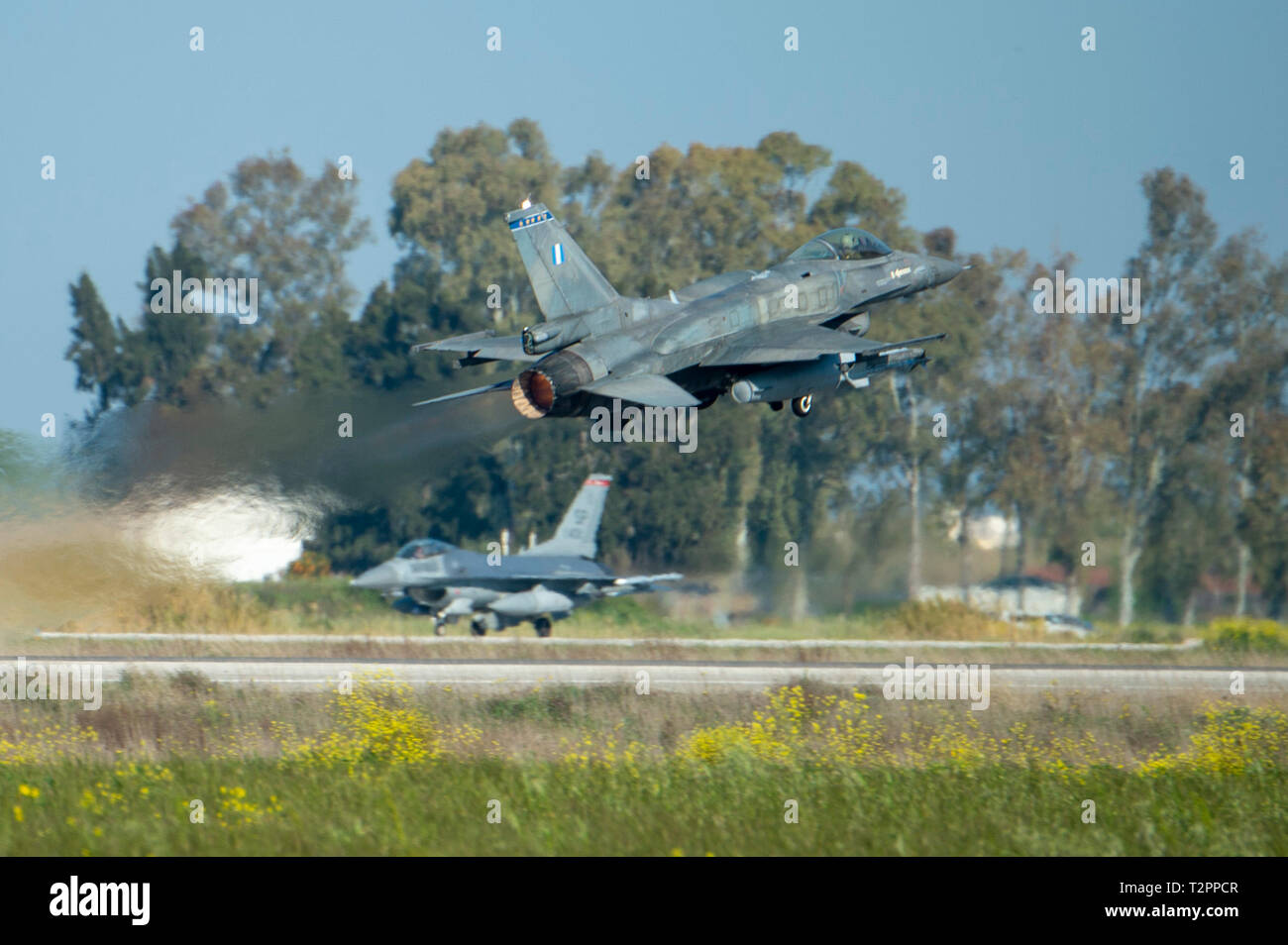 A Greek air force F-16 takes off during exercise INIOCHOS 19 at Andravida Air Base, Greece, April 2, 2019.The exercise provides a chance for Airmen and aircraft of the 480th Expeditionary Fighter Squadron to work alongside allied air forces and better cooperate to accomplish their mission.  (U.S. Air Force photo by Airman 1st Class Branden Rae) Stock Photo