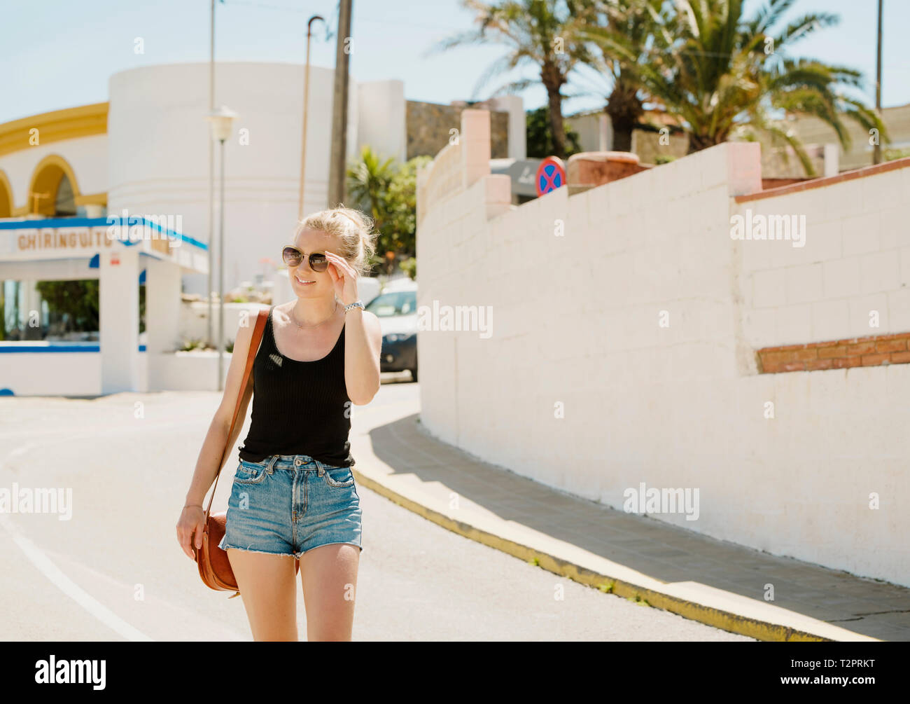 Woman exploring town, Garraf, Catalonia, Spain Stock Photo