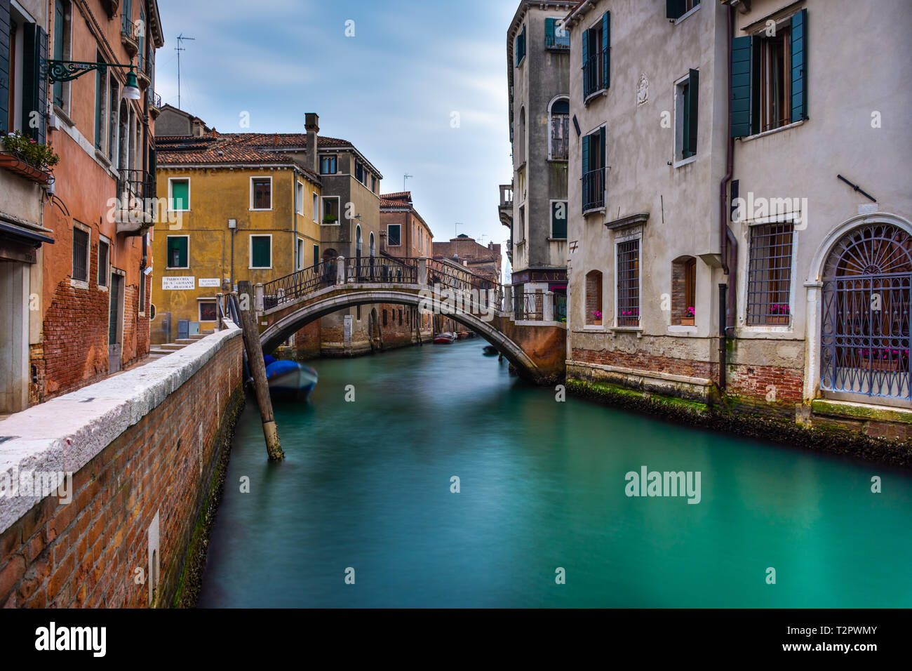 Canal in Venice with traditional old houses, Italy Stock Photo - Alamy