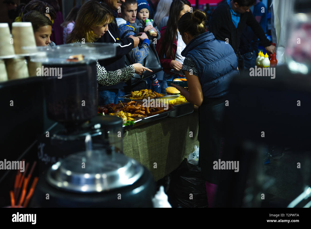 LVIV, UKRAINE - September 15, 2018: street food concept. people