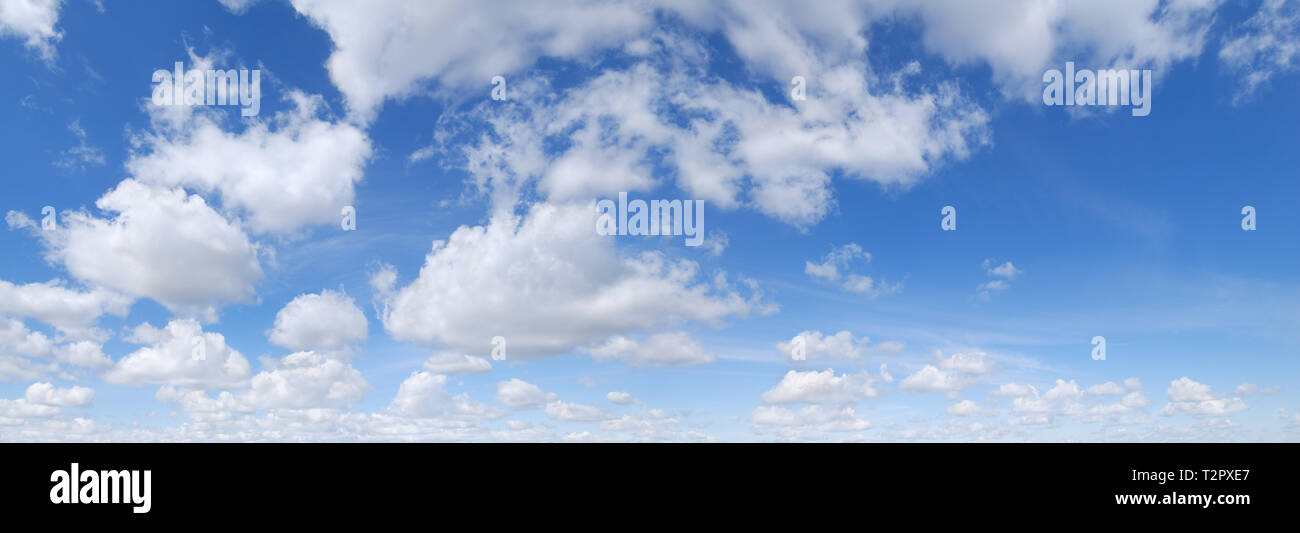 Cloudscape - Blue sky and white clouds, panorama Stock Photo - Alamy