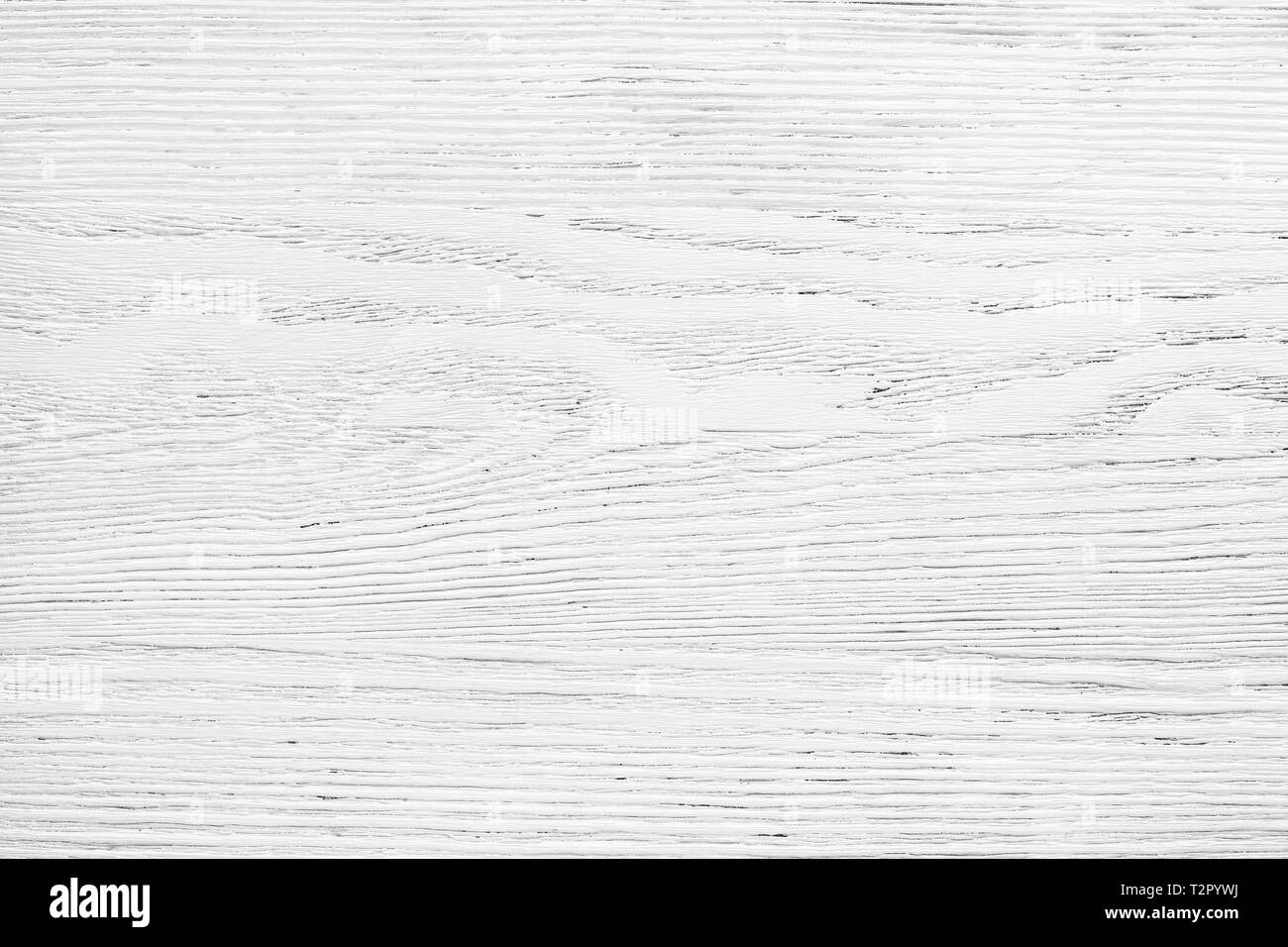 Old wooden board painted white.  Aged wood texture for background. Stock Photo