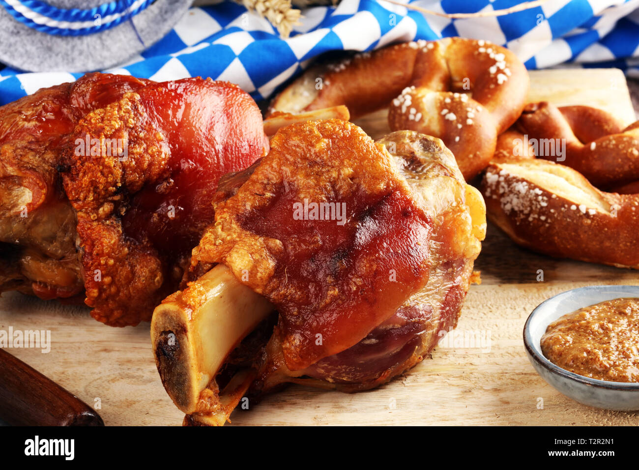 Traditional German cuisine, Schweinshaxe roasted ham hock. pretzels