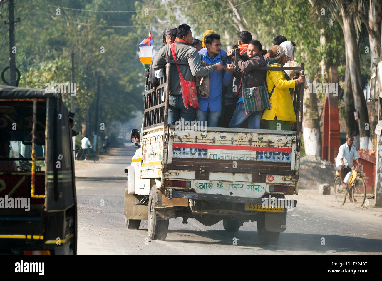 People on a pickup truck in Ambagon, Northeast-India  ---   Transporter in Ambagon, Assam, Indien Stock Photo