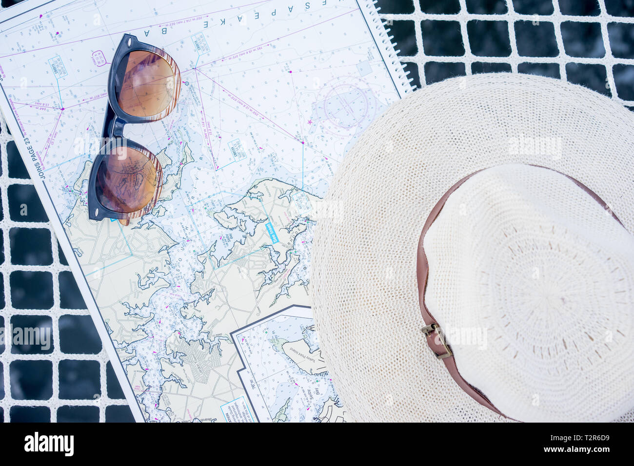 Navigating Hat Sailing Hat and Map Stock Photo - Alamy