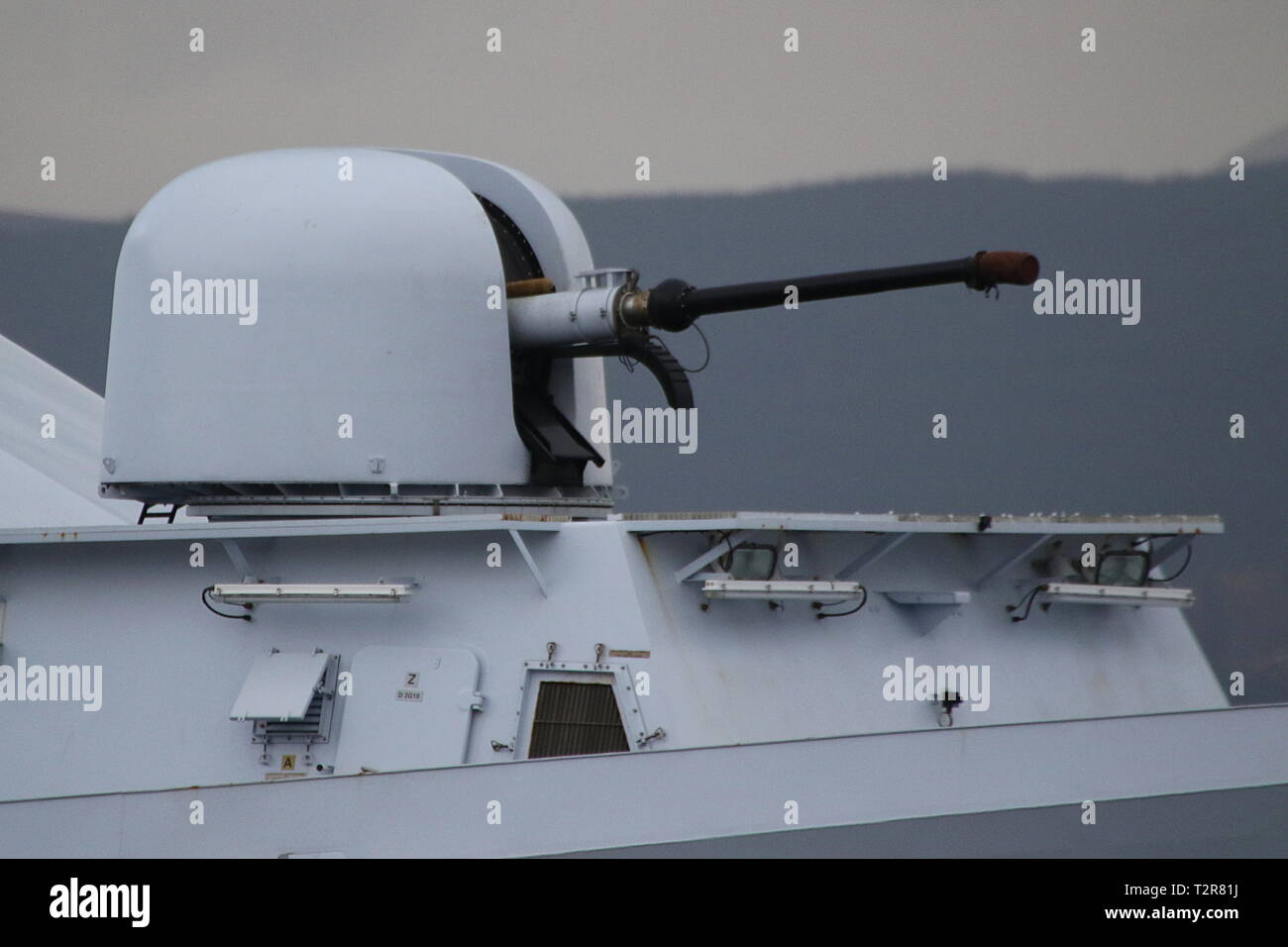 An OTO Melara 76mm Super Rapid naval gun on board the Royal Netherlands Navy's HNLMS Friesland (P842), a Holland-class offshore patrol vessel. Stock Photo