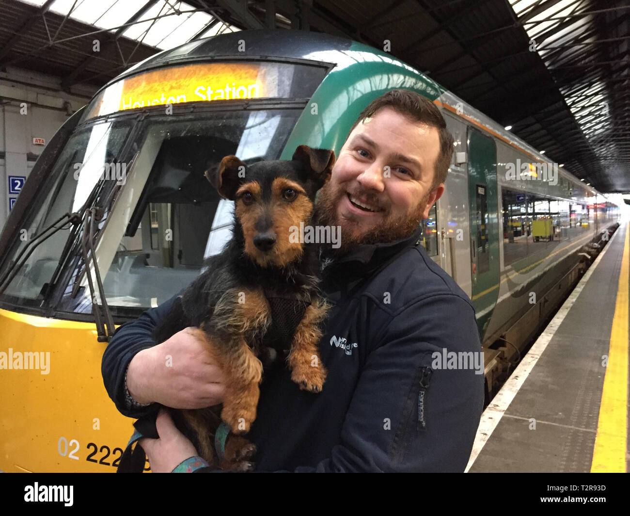Irish rail worker ted maher with intrepid travelling dog hamish hi