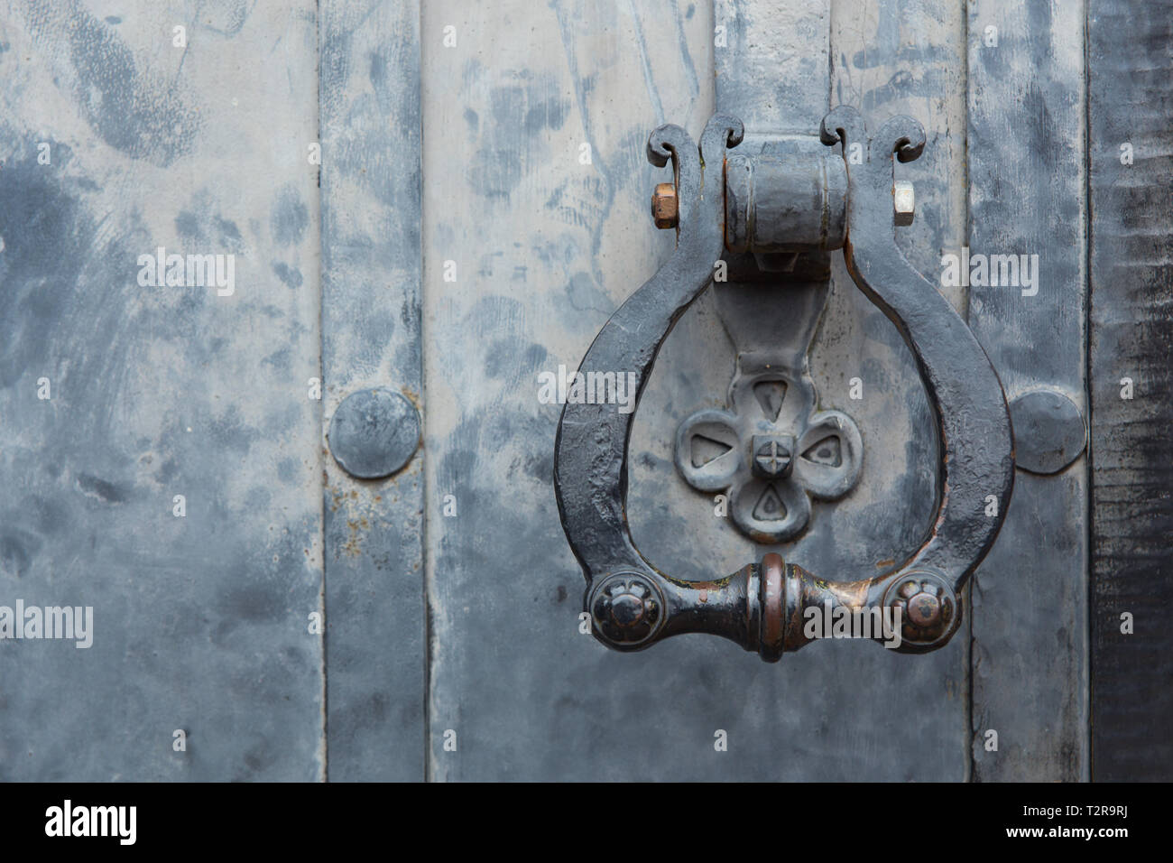 Old Decorative Door Handle On Metal Door In Ancient Castle Stock