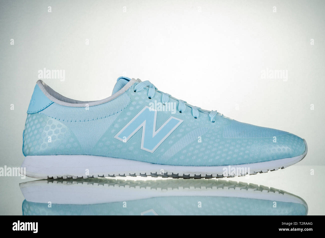 New Balance sports shoes isolated on gradient background Stock Photo - Alamy