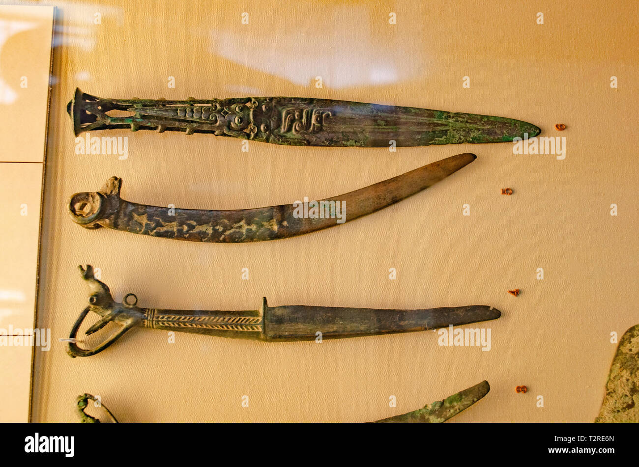 Bronze knives with various heads. Shang Dynasty 11th-12th century