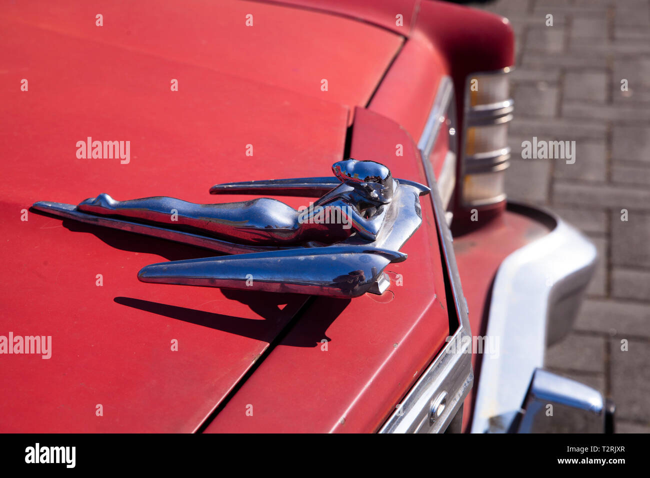 hood ornament of a lying woman of a Ford Country Squire Station Wagon, Cologne, Germany.  Kuehlerfigur einer liegenden Frau an einem Ford Country Squi Stock Photo