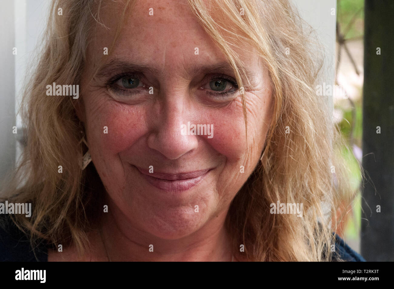 Portrait of mature woman smiling Stock Photo - Alamy
