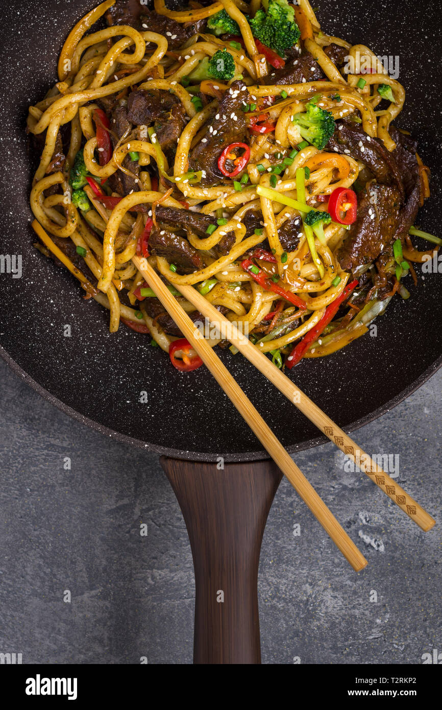 Udon StirFry Noodles with Beef and Vegetables in Wok Pan on Dark Background Stock Photo Alamy