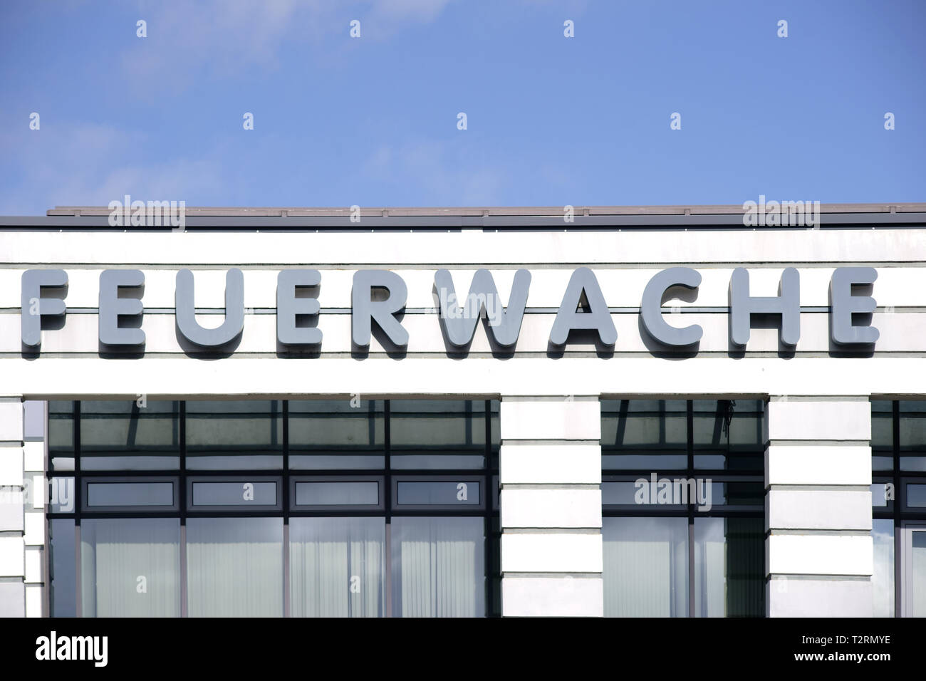 The modern roof edge of a fire station with lettering. Stock Photo