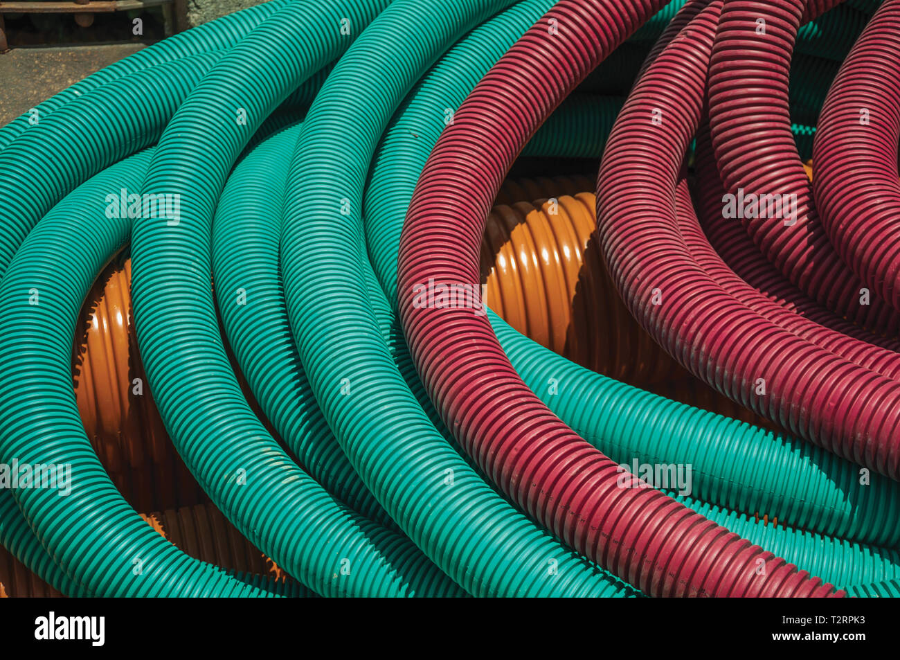 Colorful plastic pipes for electrical wiring or cables on a