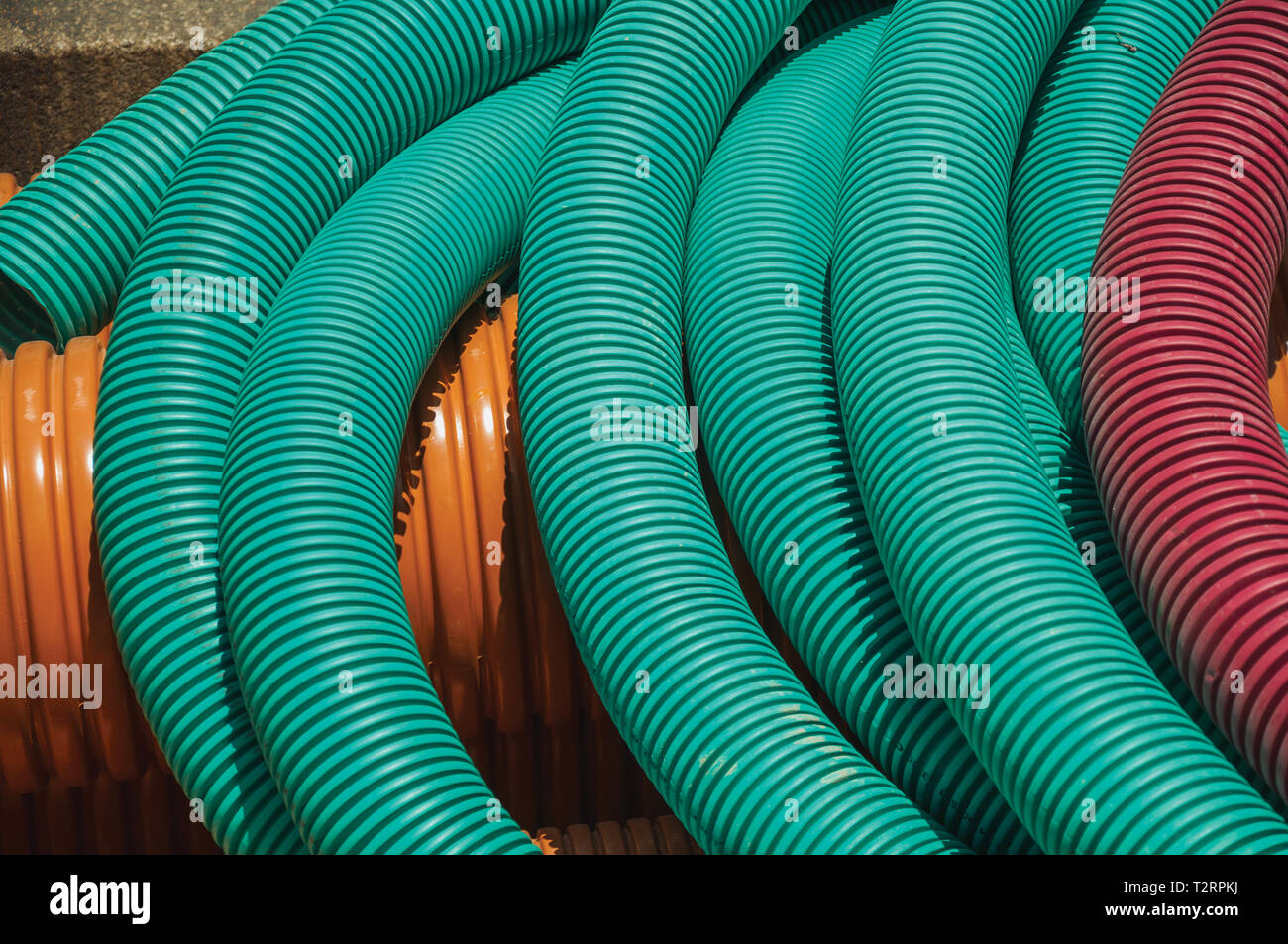 Colorful plastic pipes for electrical wiring or cables on a
