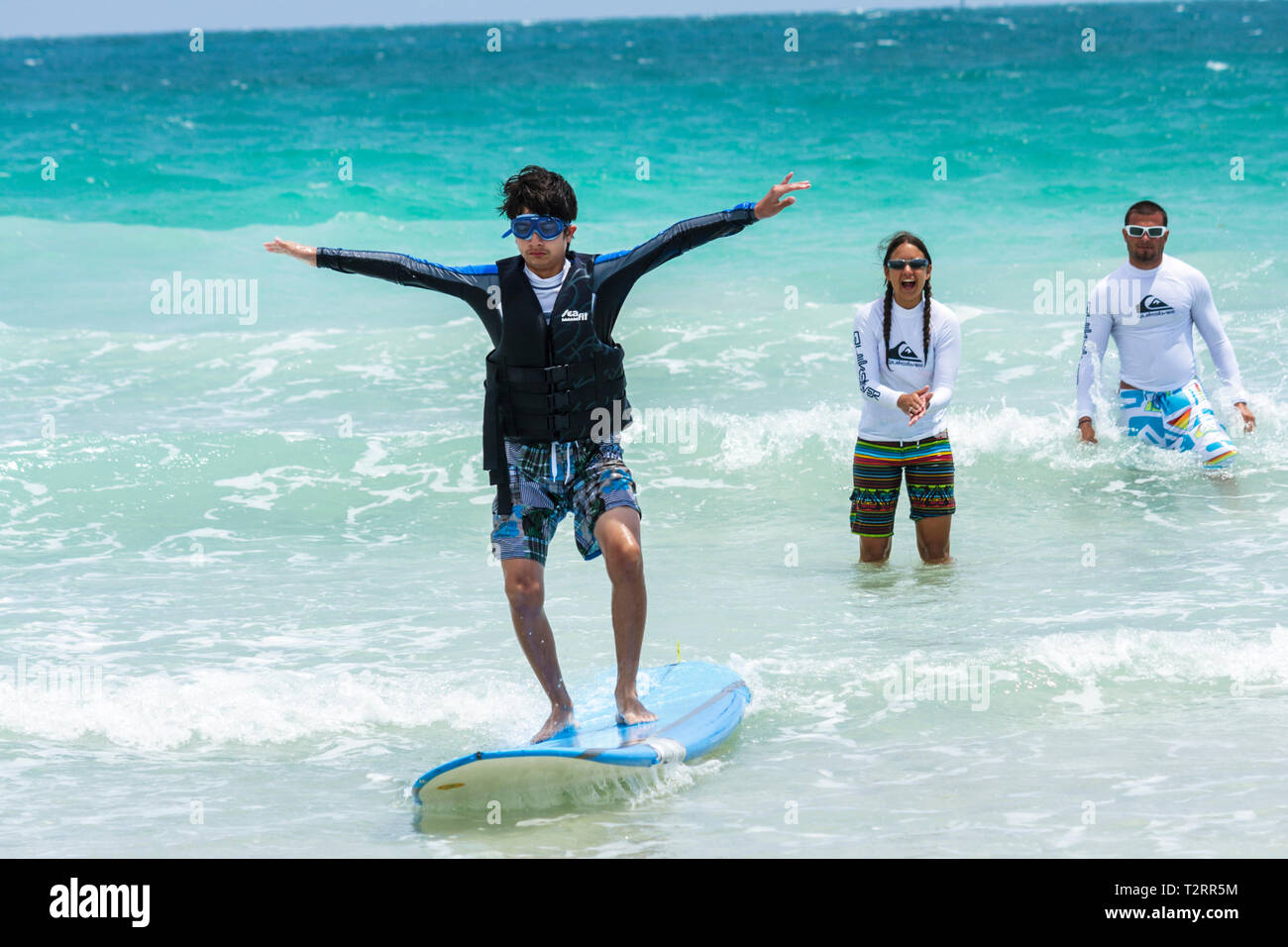 Miami Beach Florida,Atlantic Ocean,water,Recreation Department Surf Camp,high functioning autism,Aspergers Syndrome,PDD NOS,student students,counselor Stock Photo