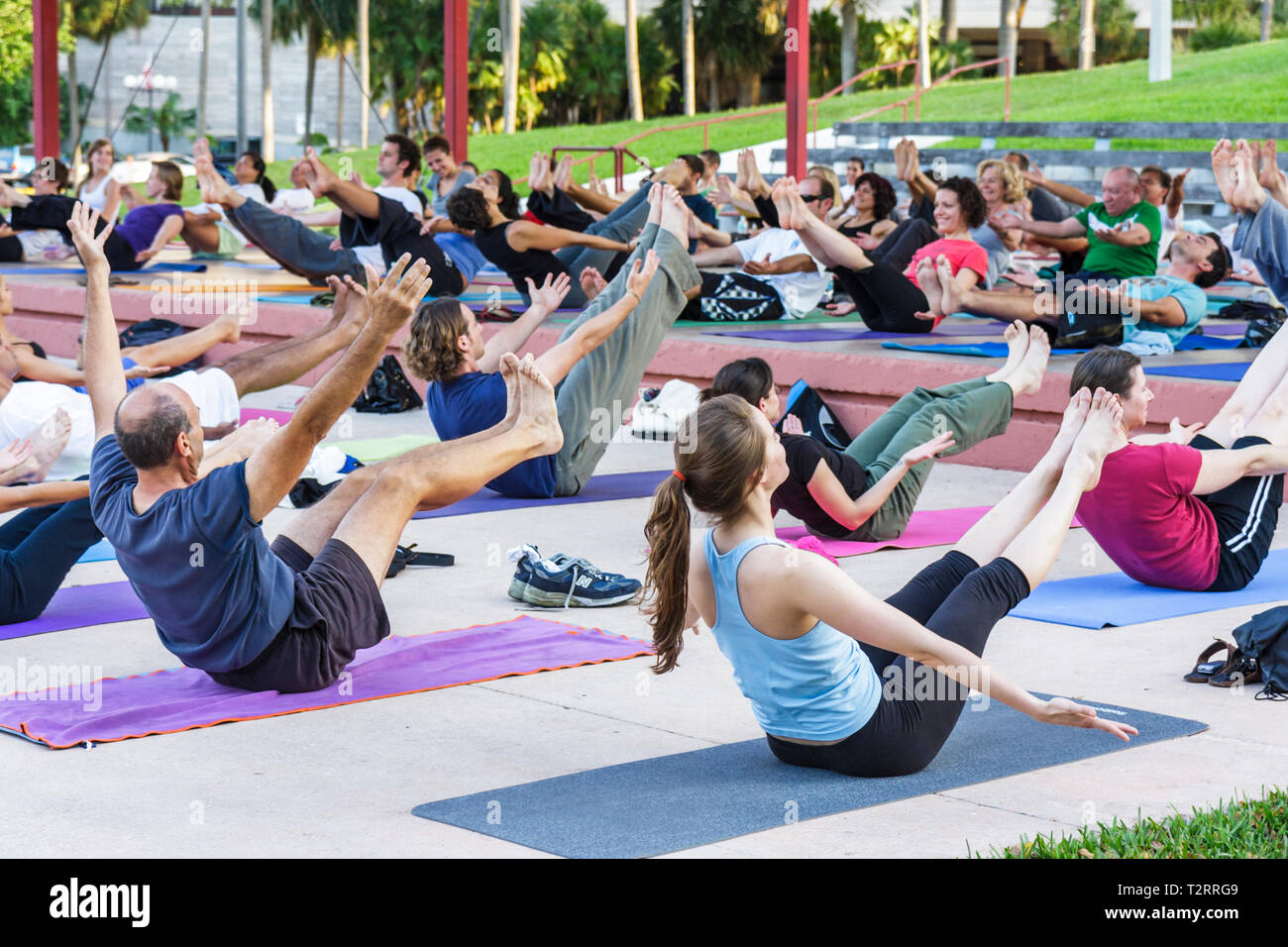 Miami Florida,Bayfront Park,yoga,class,group,dog,stretch,exercise,fitness,man men male,woman female women,health,FL090417070 Stock Photo