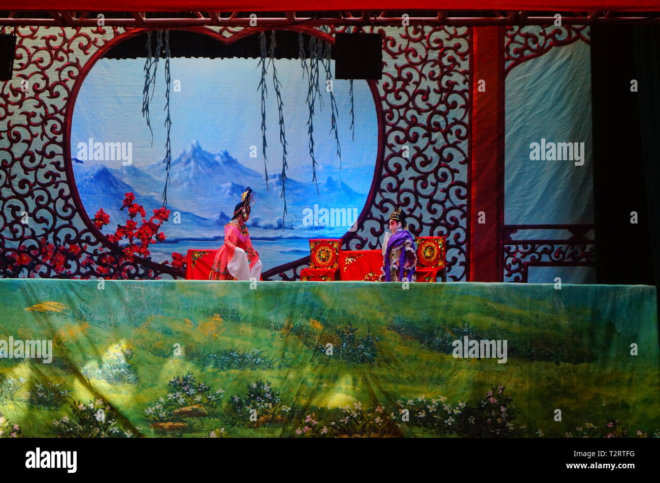 Shenzhen, China: people watch a traditional puppet show at the ...