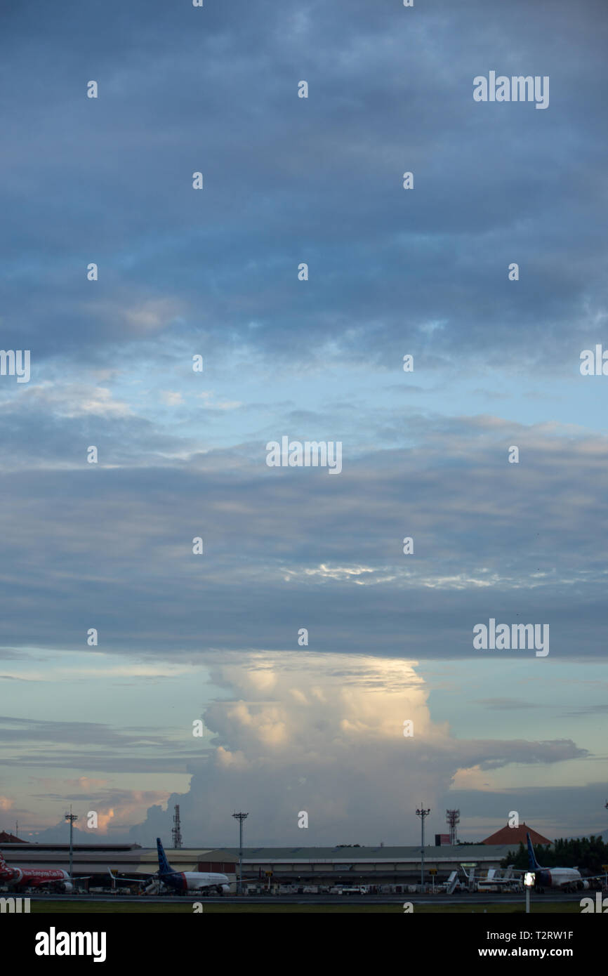 The alto stratus cloud with cumulus cloud and towering cumulus growing at the background Stock Photo