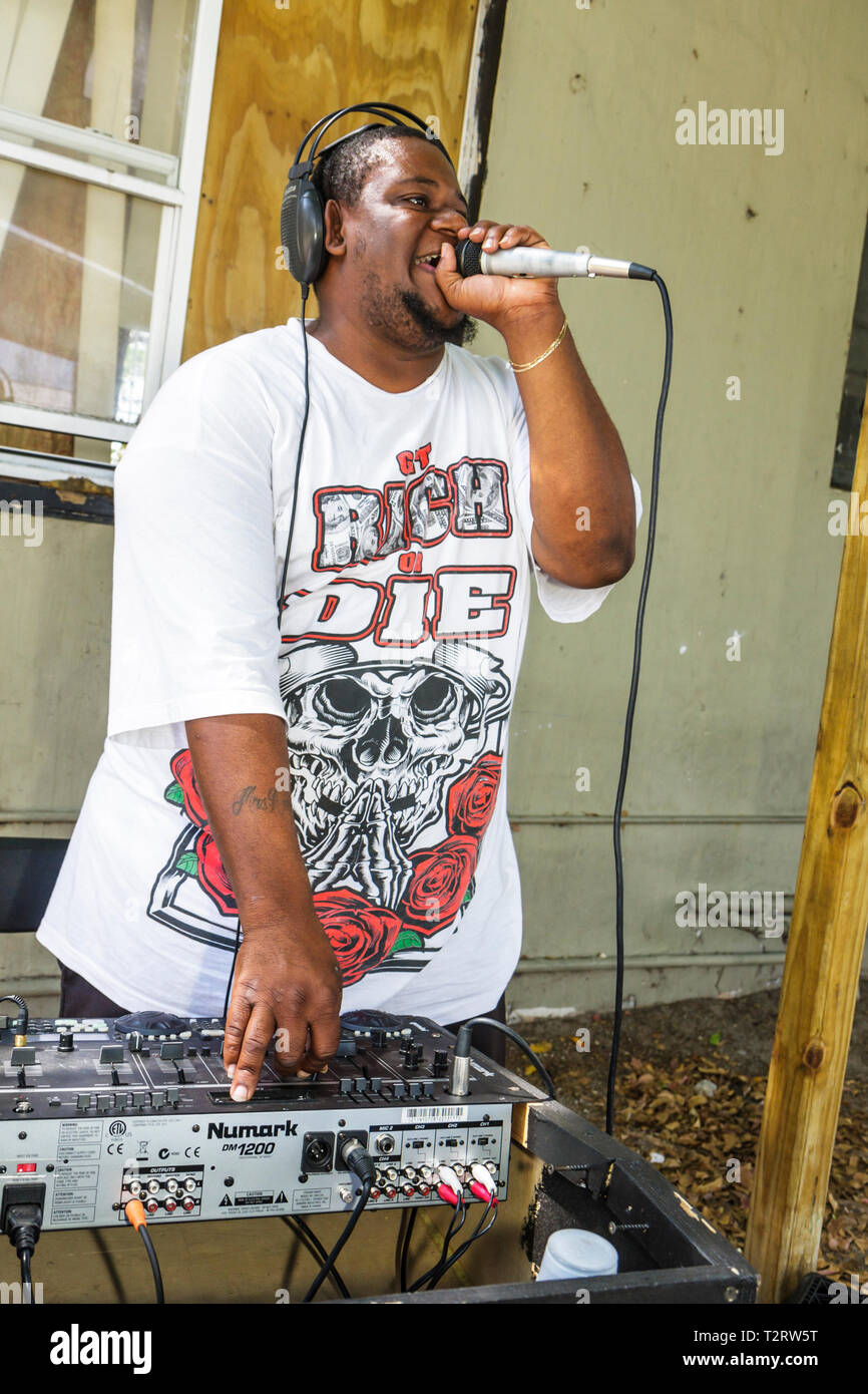 Miami Florida,Overtown,Peace Park,Black man men male,young adult,urban,rapper,microphone,hip hop artist,DJ,audio mixer,Numark 1200,entertain,entertain Stock Photo